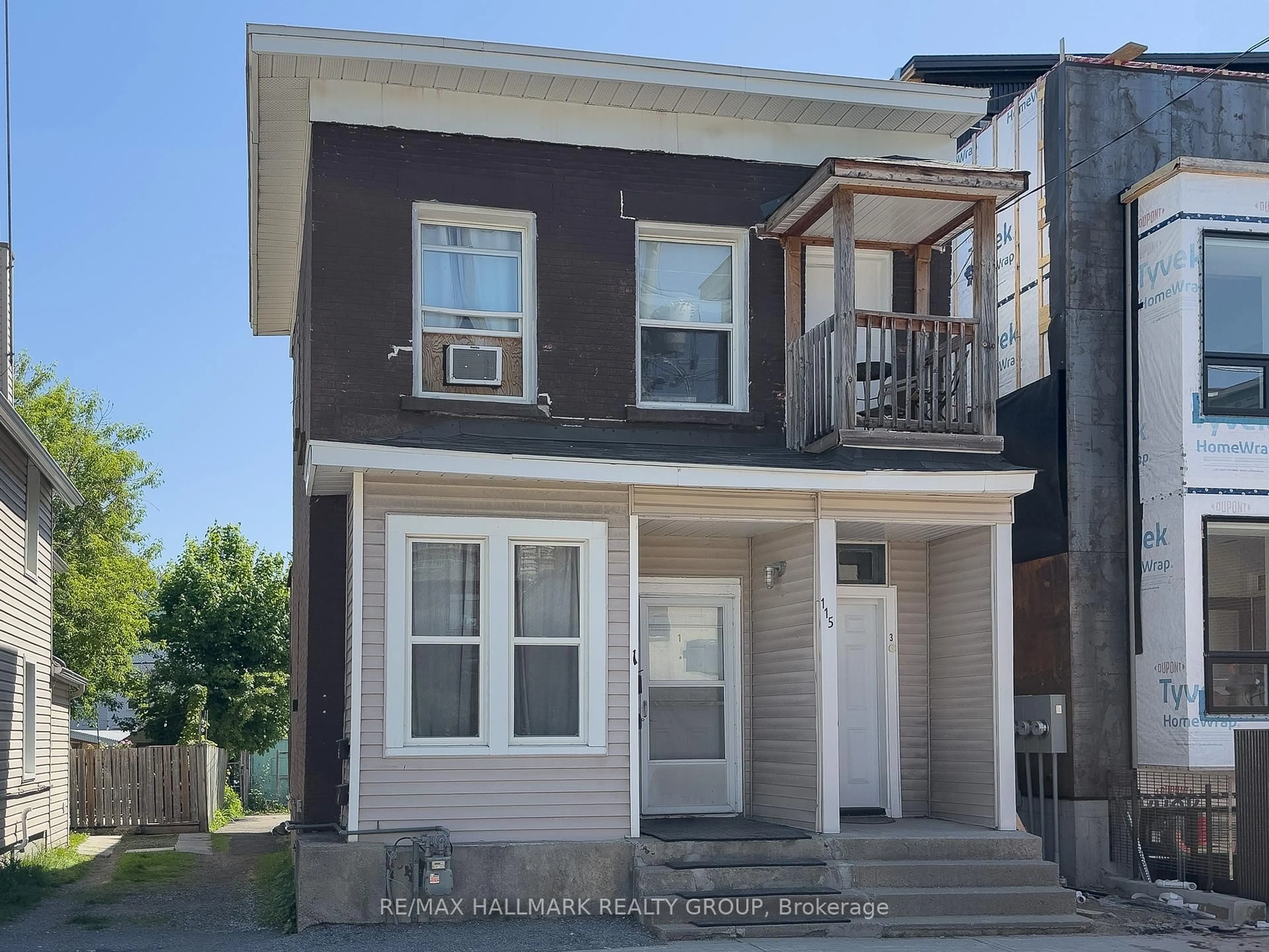 Home with vinyl exterior material, street for 115 Carruthers Ave, Ottawa Ontario K1Y 1N4