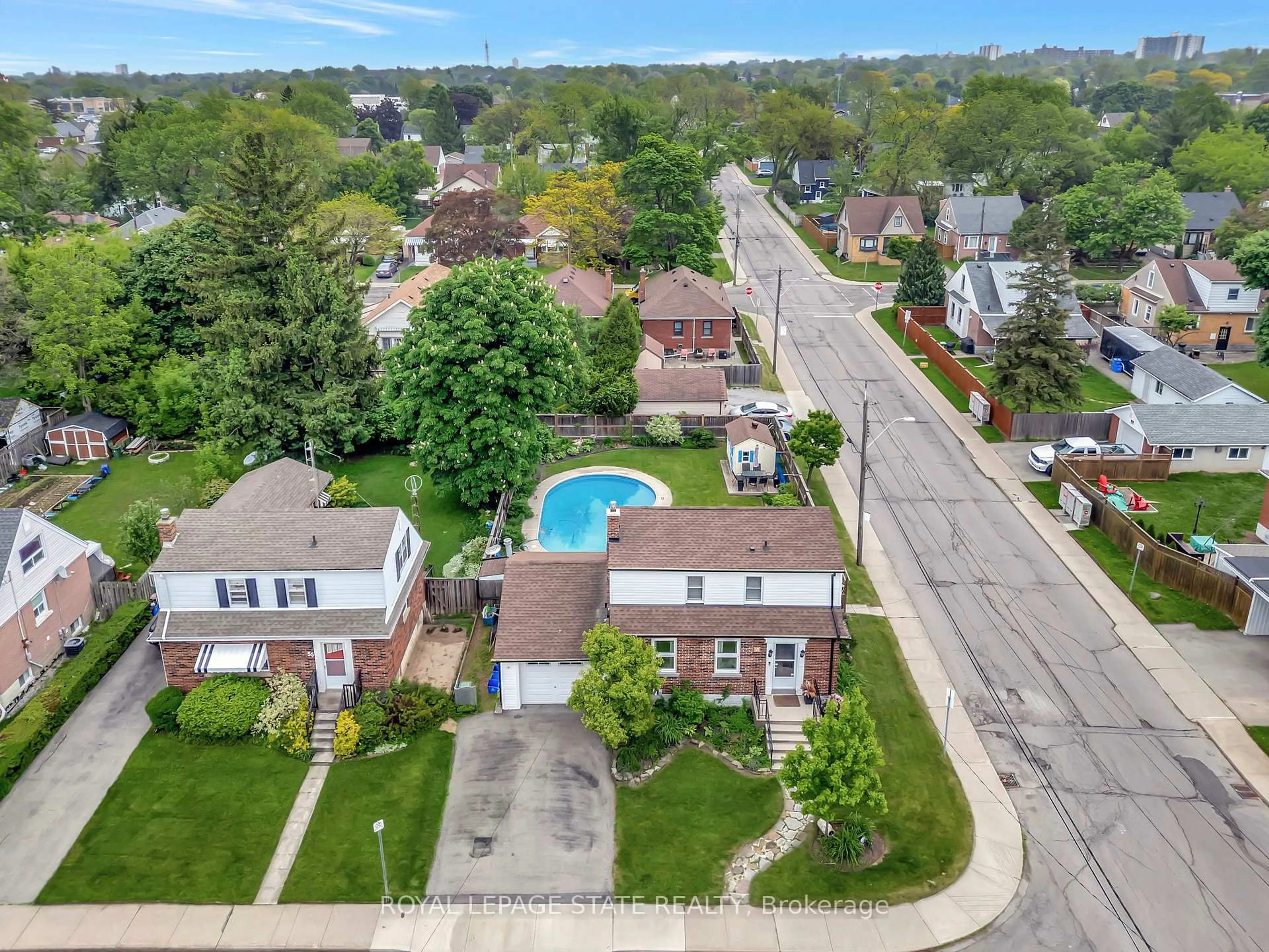 A pic from outside/outdoor area/front of a property/back of a property/a pic from drone, street for 57 West 4th St, Hamilton Ontario L9C 3M5
