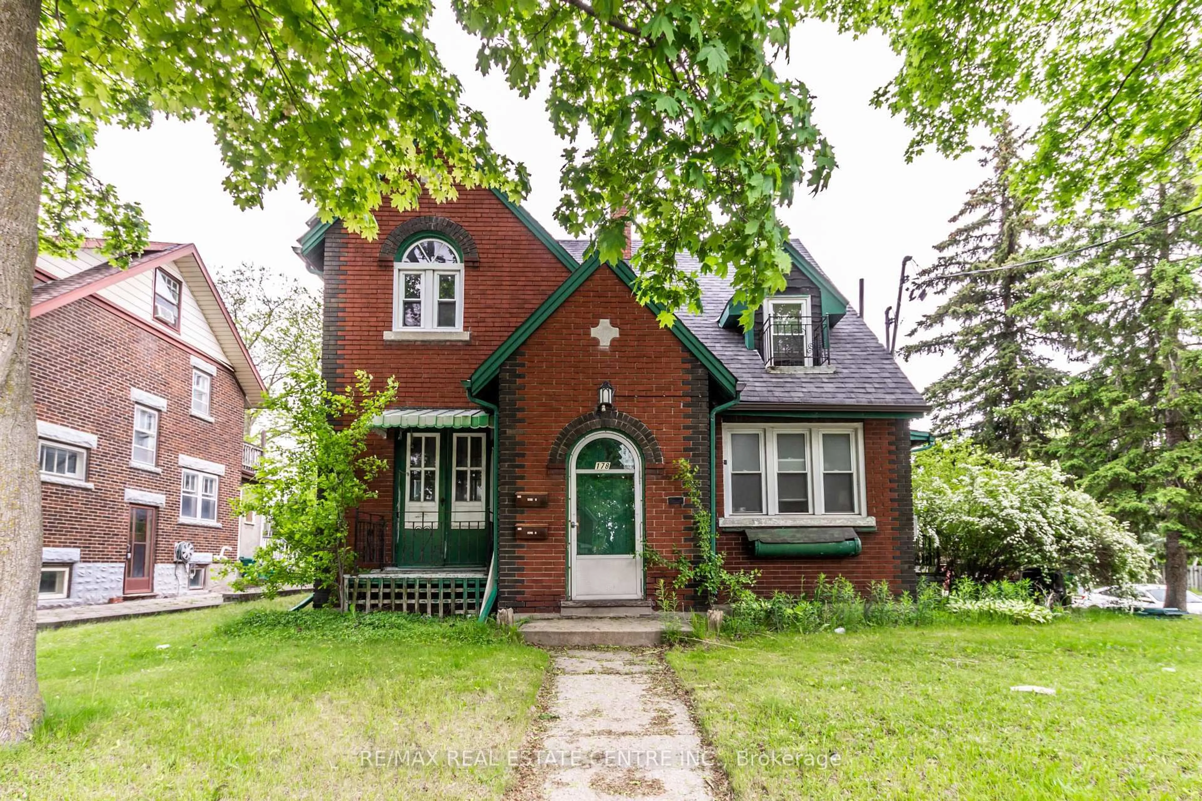 Home with brick exterior material, street for 178 Erb St, Waterloo Ontario N2L 1V3