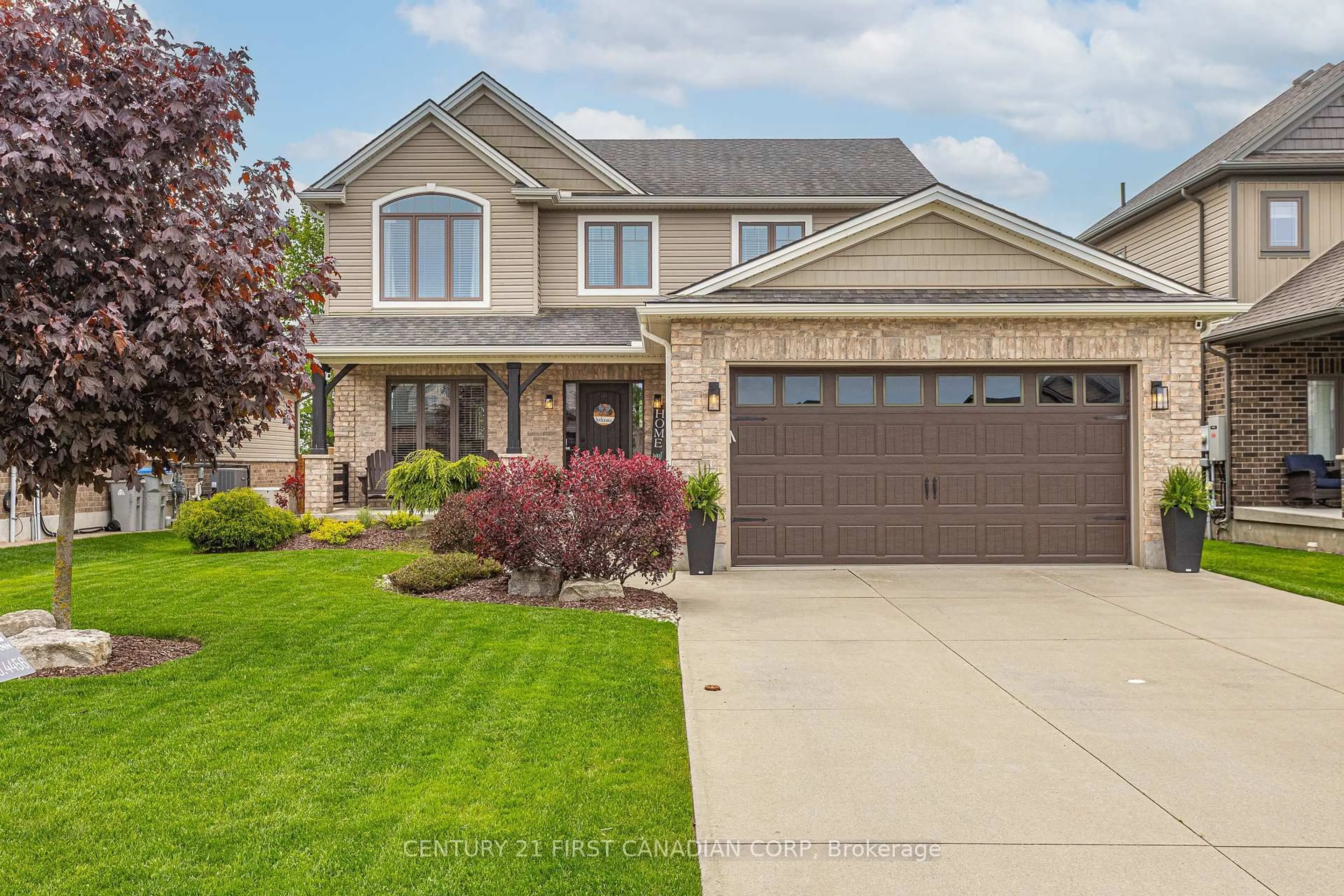 Home with vinyl exterior material, street for 165 Watson St, Lucan Biddulph Ontario N0M 2J0