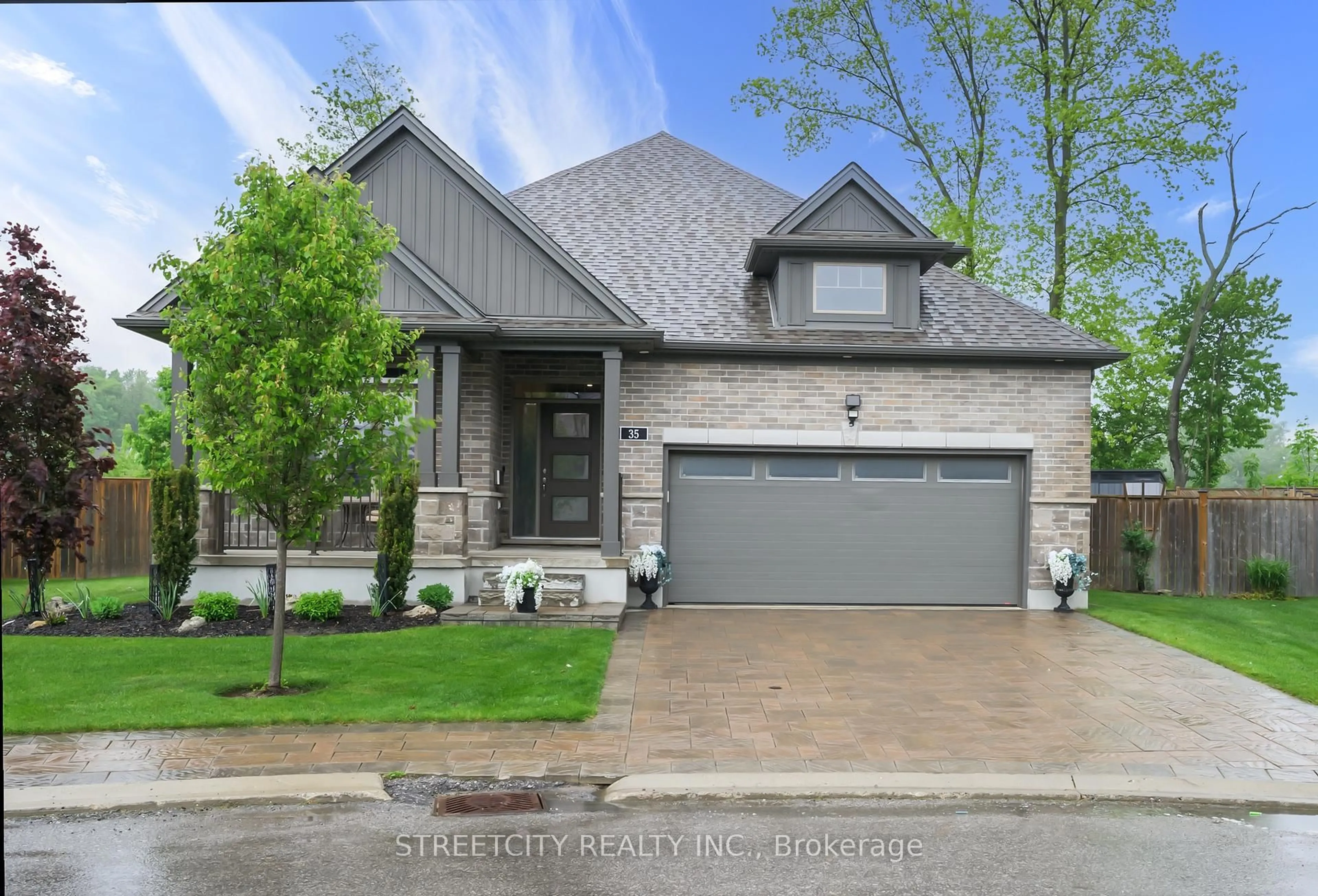 Home with brick exterior material, street for 1061 Eagletrace Dr #35, London North Ontario N6G 0T3