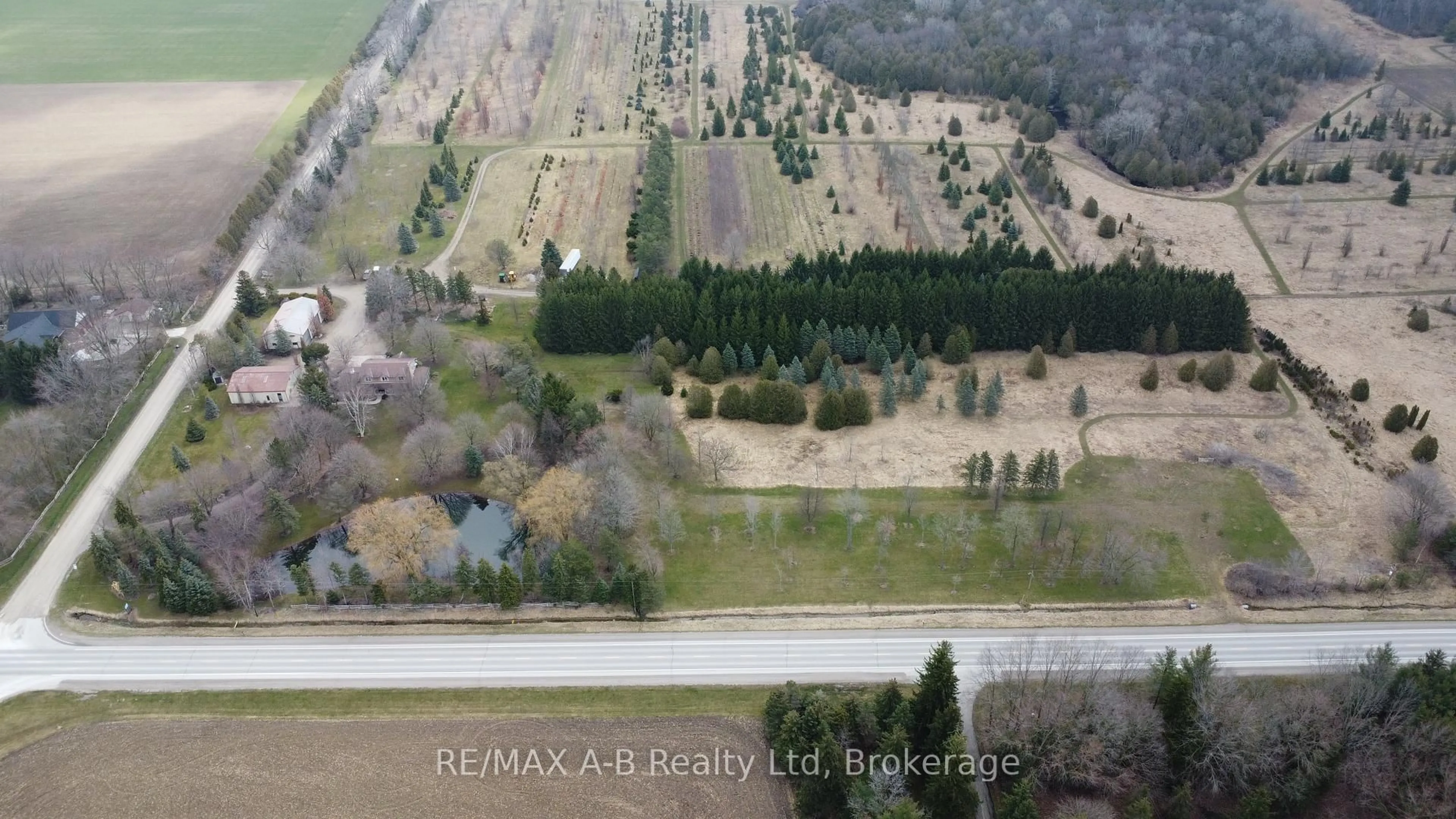 A pic from outside/outdoor area/front of a property/back of a property/a pic from drone, forest/trees view for 882984 RD 88, Zorra Ontario N0M 2M0