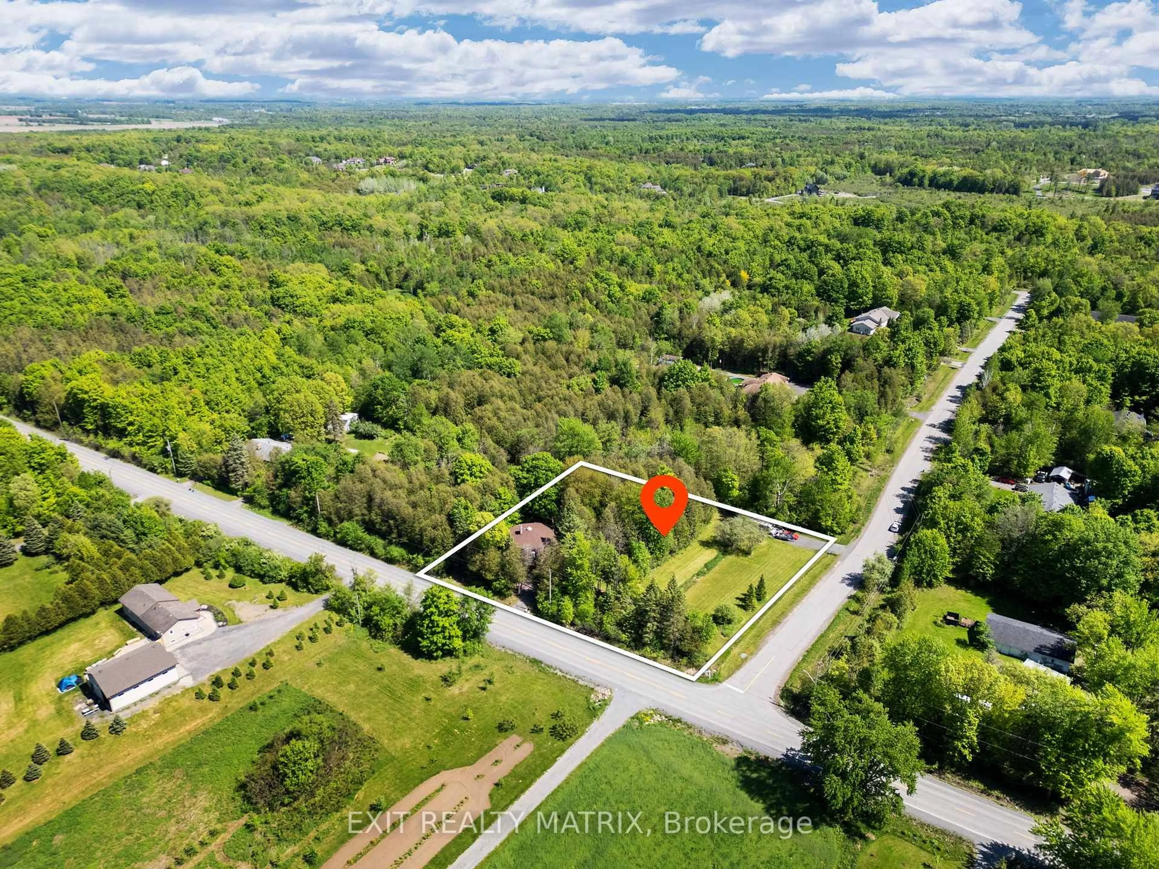 A pic from outside/outdoor area/front of a property/back of a property/a pic from drone, forest/trees view for 7962 Parkway Rd, Metcalfe Ontario K0A 2P0