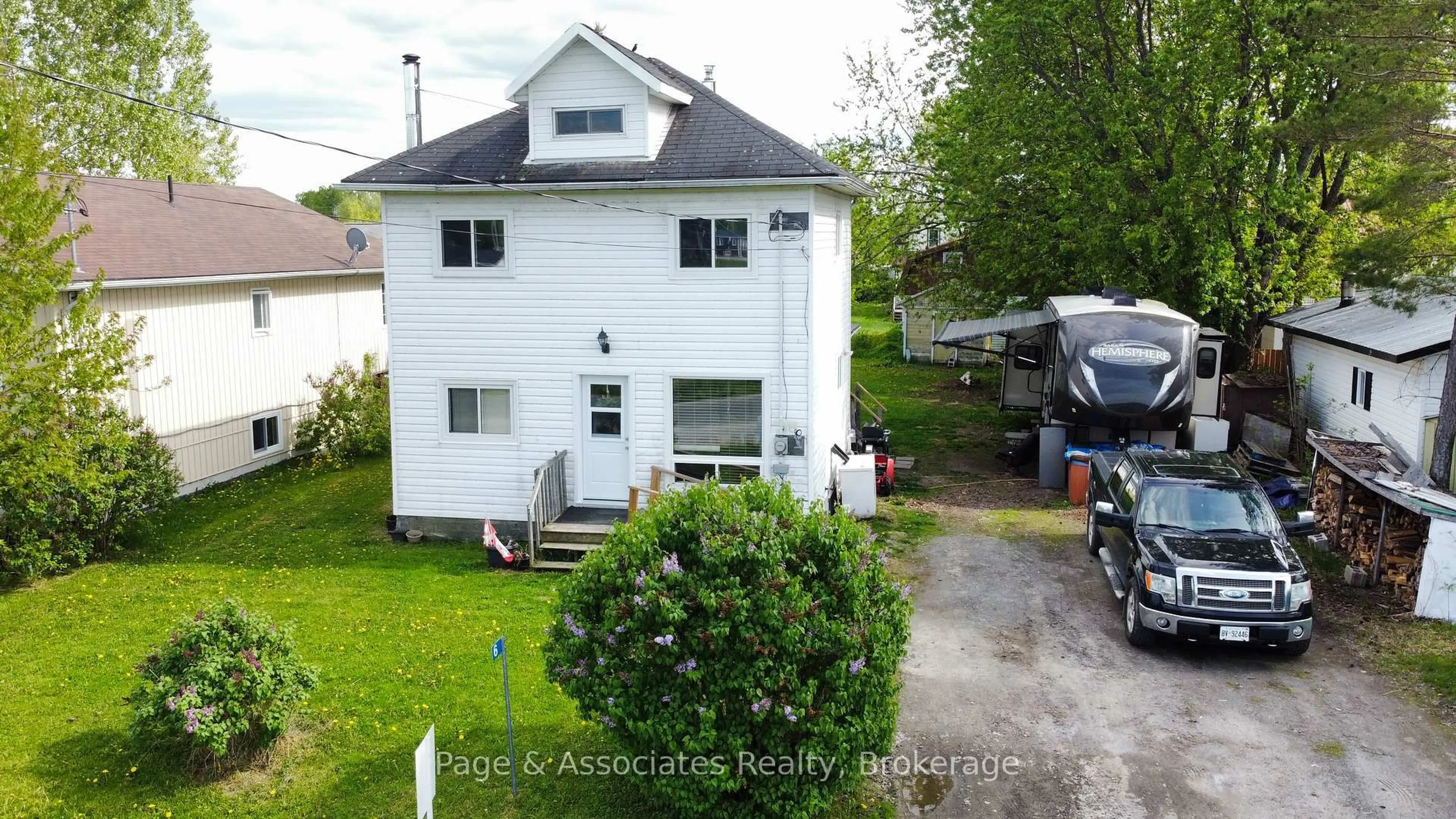 A pic from outside/outdoor area/front of a property/back of a property/a pic from drone, street for 6 Caron Rd, West Nipissing Ontario P0H 1R0