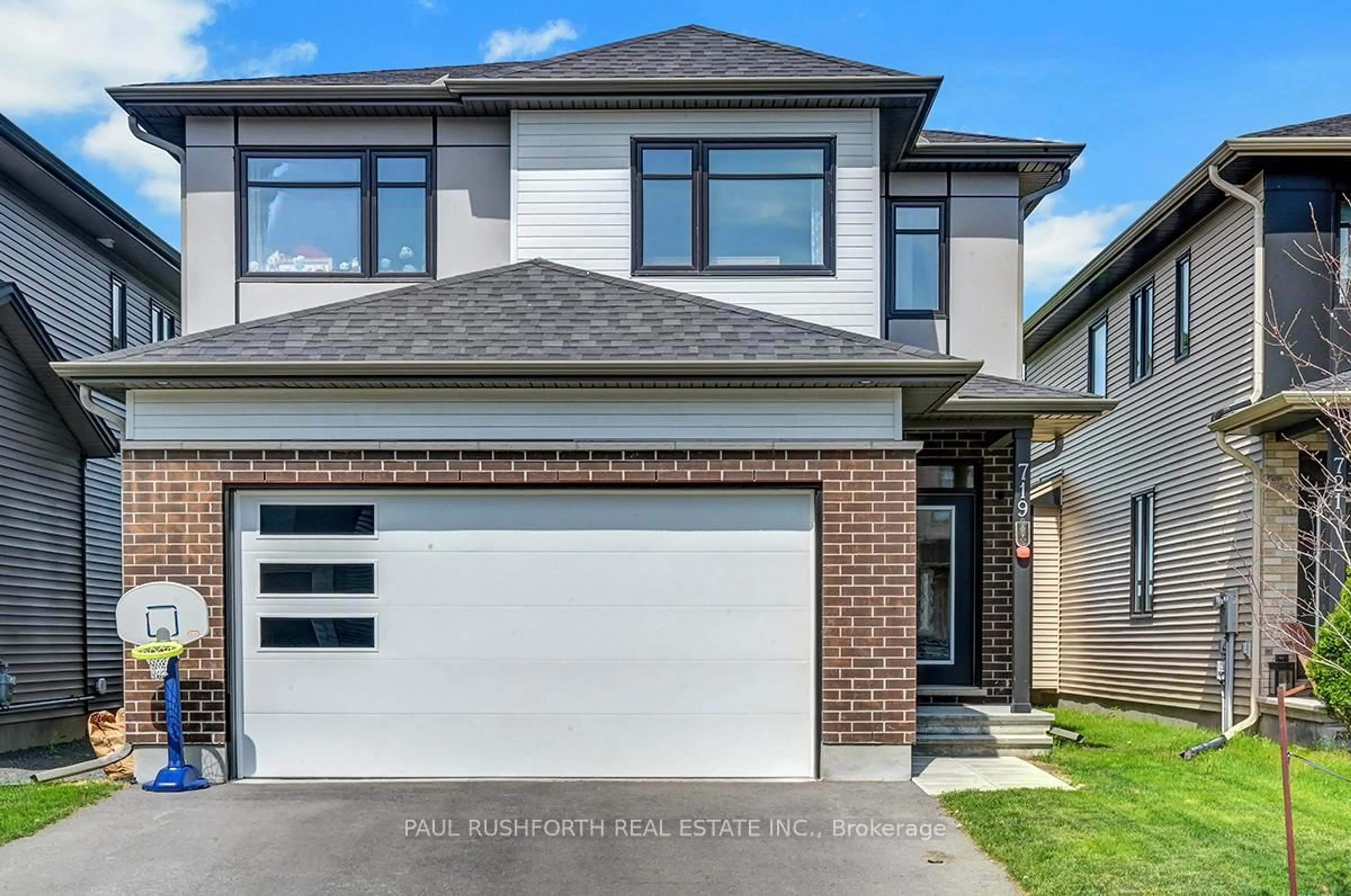 Home with brick exterior material, street for 719 Painted Sky Way, Stittsville Ontario K2S 2W7