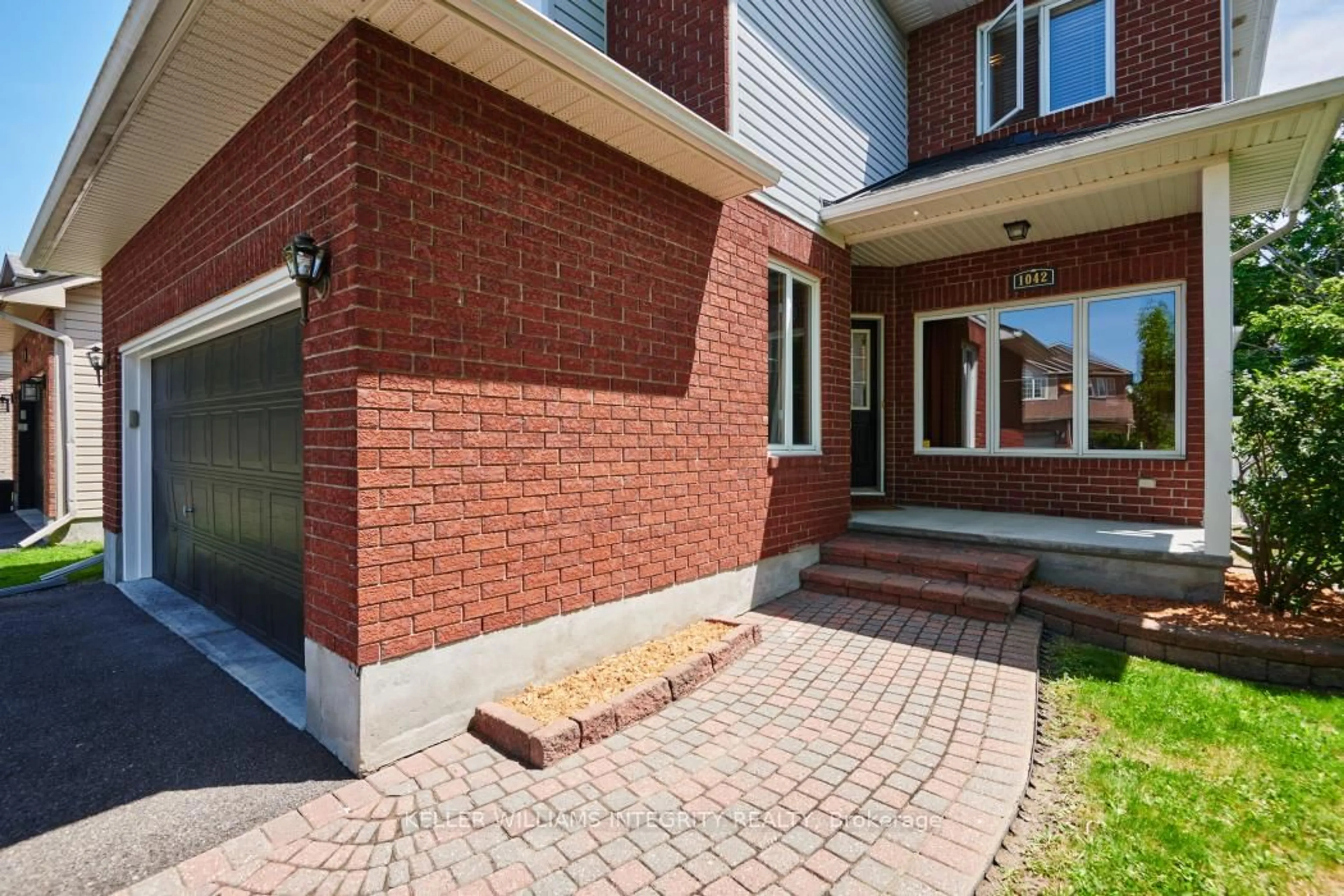 Home with brick exterior material, street for 1042 Rocky Harbour Cres, Ottawa Ontario K1V 1V2