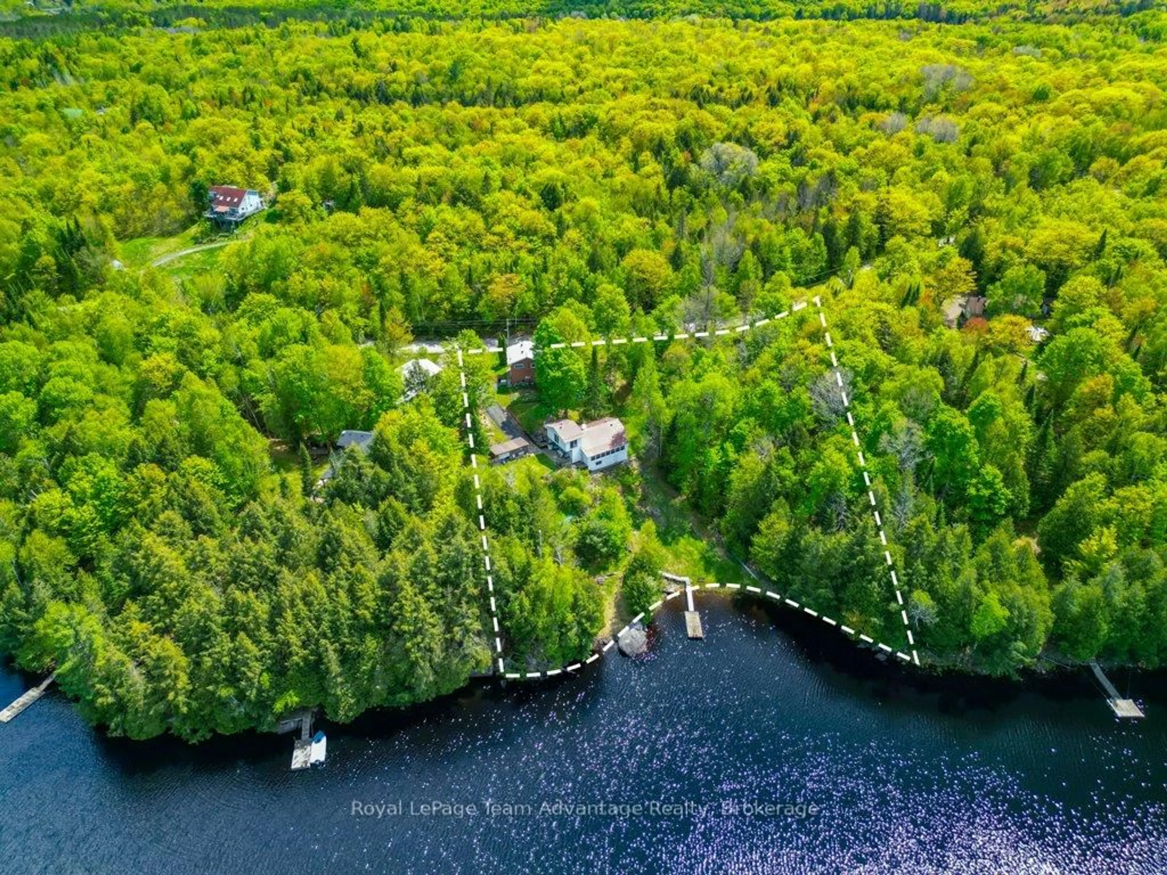 A pic from outside/outdoor area/front of a property/back of a property/a pic from drone, water/lake/river/ocean view for 15 Labrash Lake Rd, Whitestone Ontario P0A 1G0