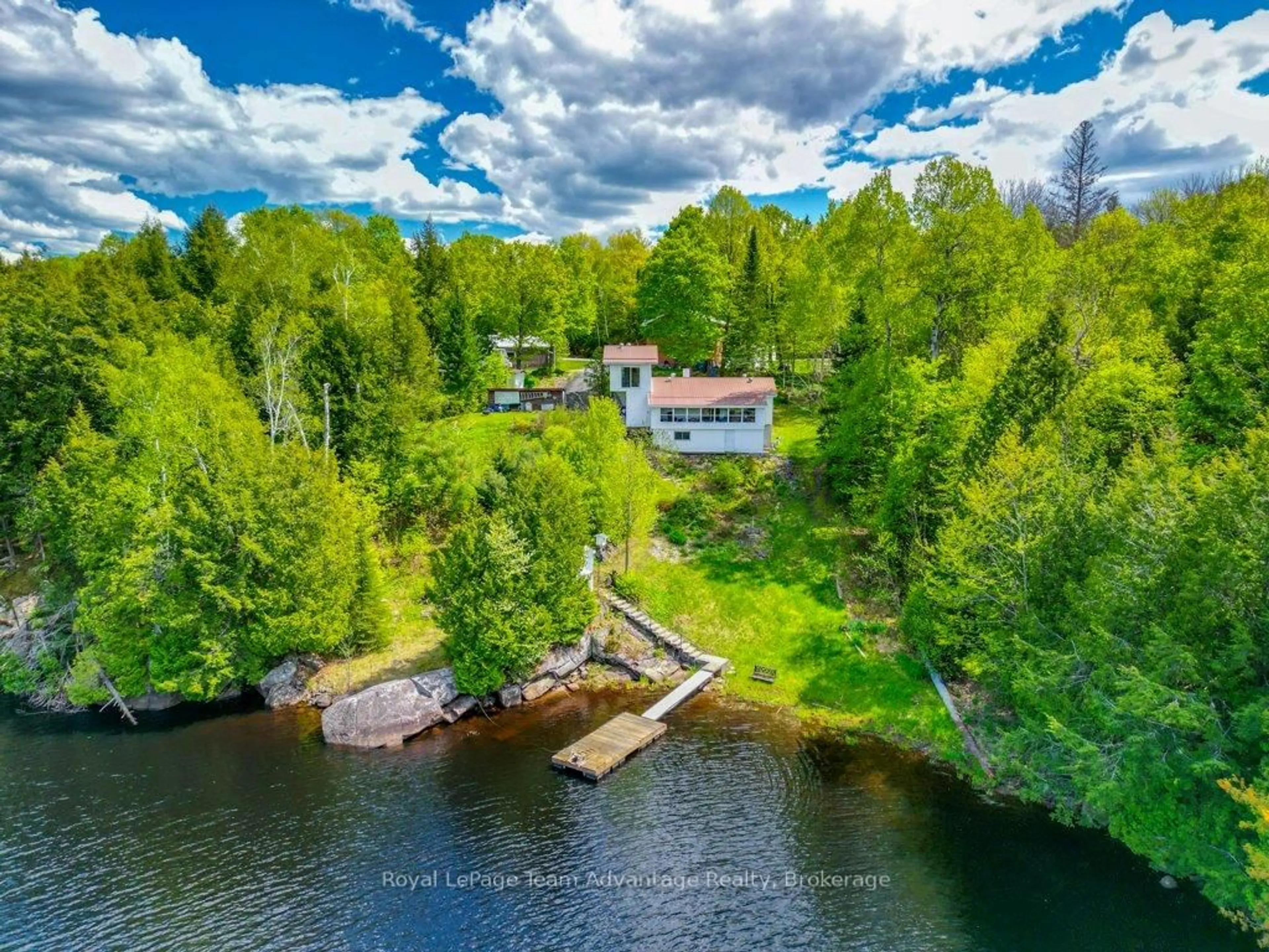 A pic from outside/outdoor area/front of a property/back of a property/a pic from drone, water/lake/river/ocean view for 15 Labrash Lake Rd, Whitestone Ontario P0A 1G0
