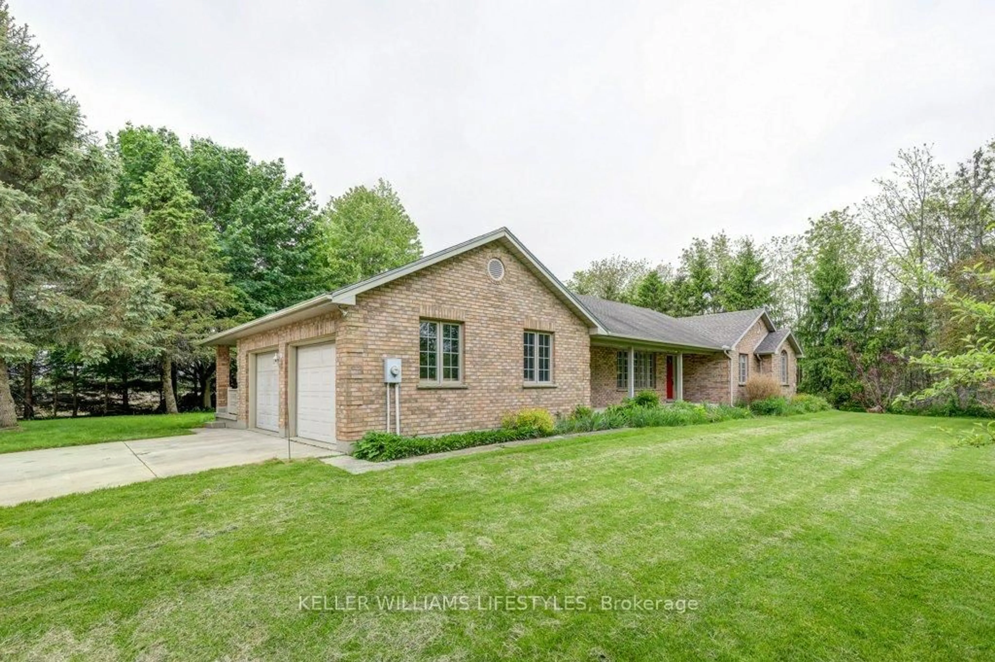 Home with brick exterior material, street for 24317 Coldstream Rd, Middlesex Centre Ontario N0M 2A0