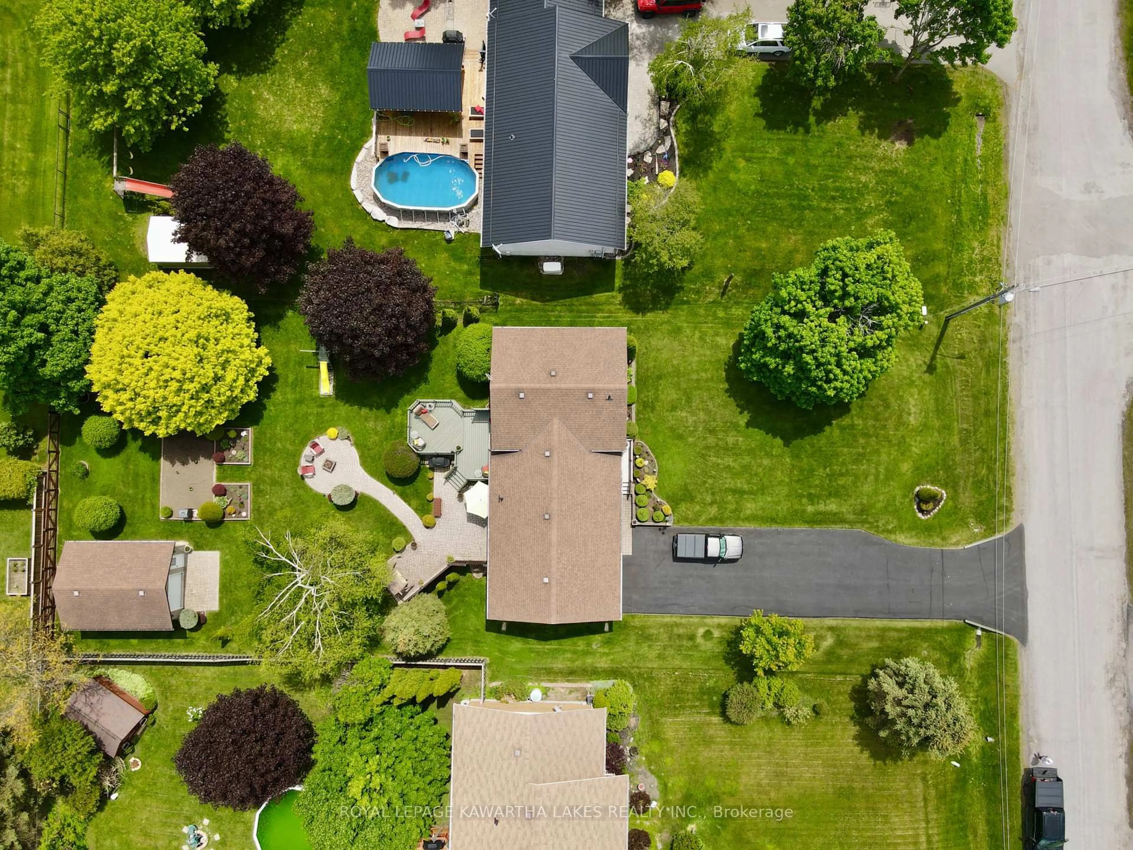 A pic from outside/outdoor area/front of a property/back of a property/a pic from drone, street for 30 Grant Dr, Kawartha Lakes Ontario K0M 2M0