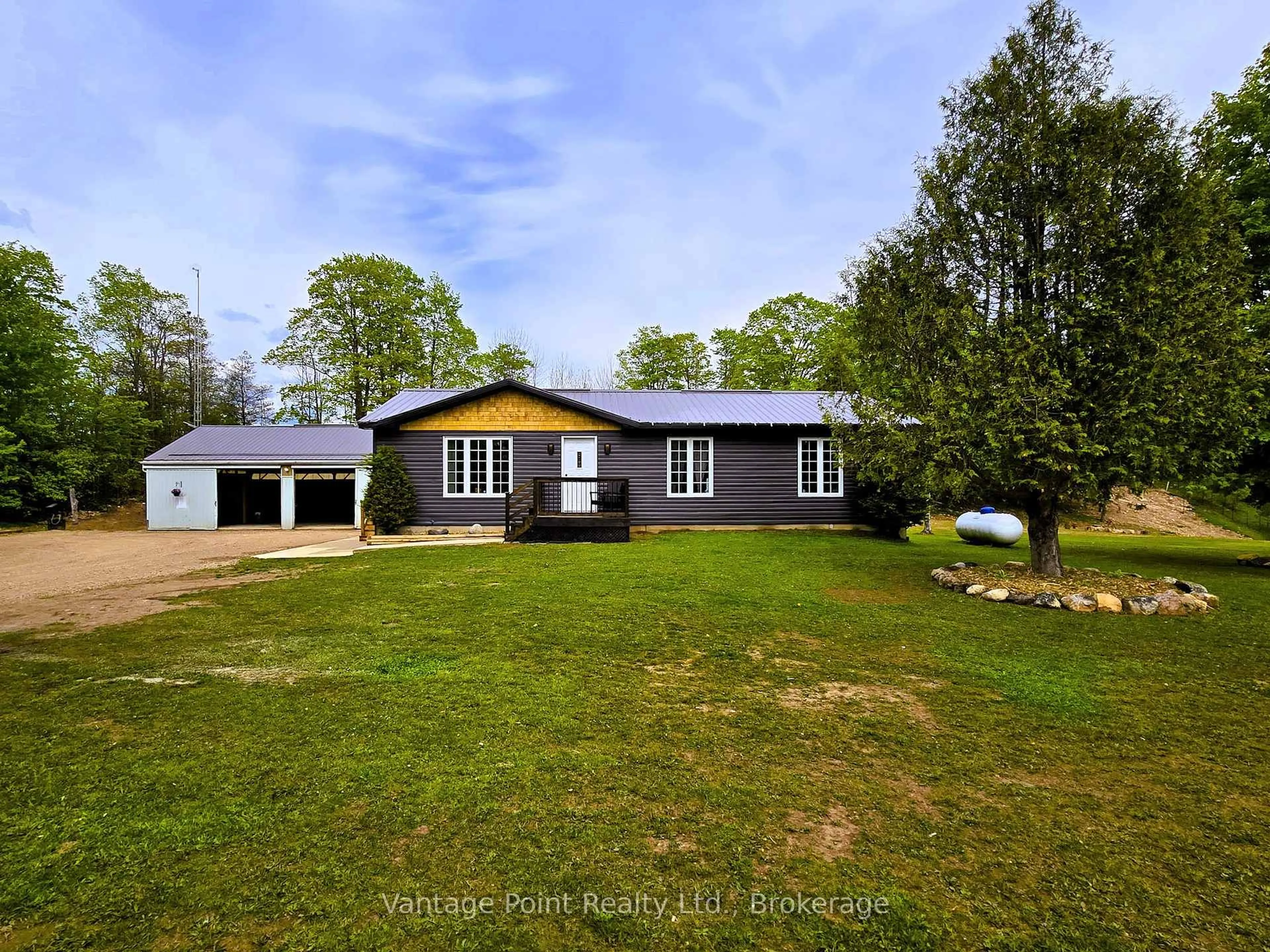 A pic from outside/outdoor area/front of a property/back of a property/a pic from drone, street for 544302 80 Sdrd, West Grey Ontario N0C 1H0