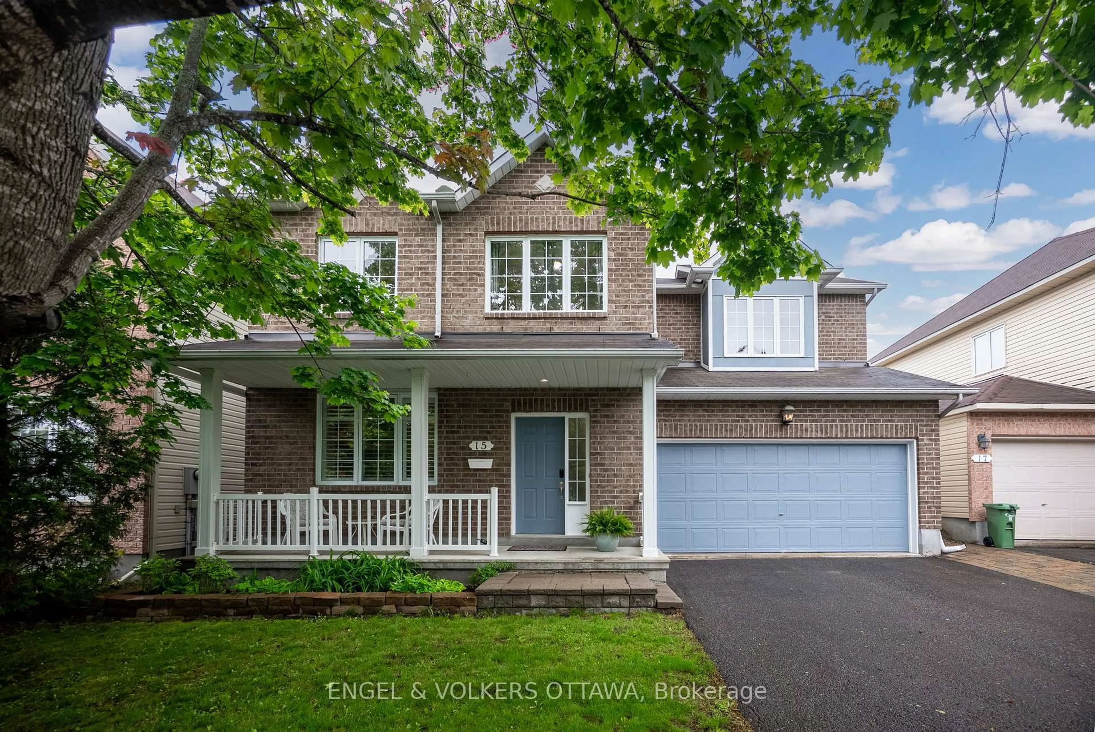 Home with brick exterior material, street for 15 Haslemere Ave, Kanata Ontario K2W 1E3