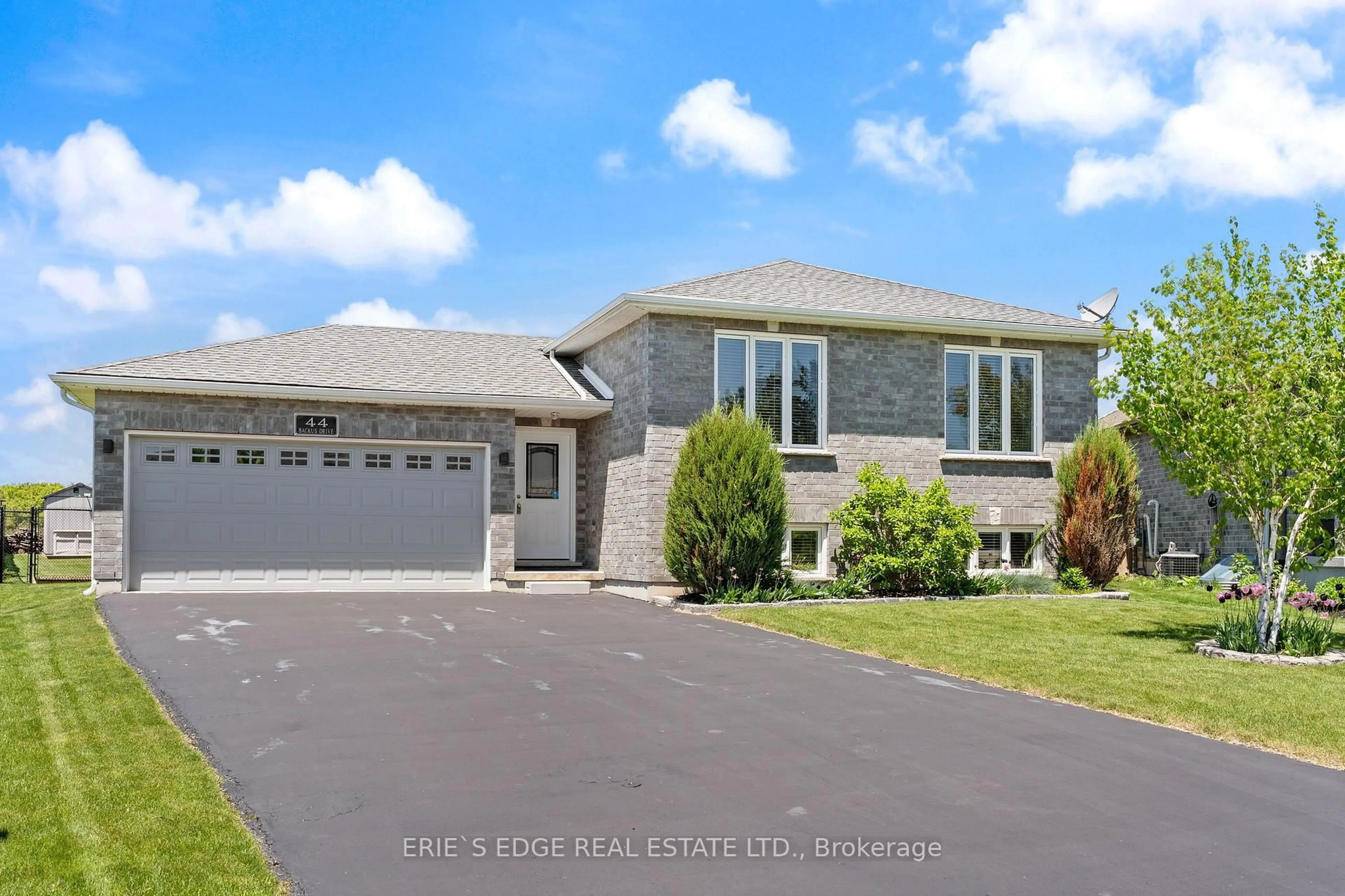 Home with vinyl exterior material, street for 44 Backus Dr, Norfolk Ontario N0E 1M0