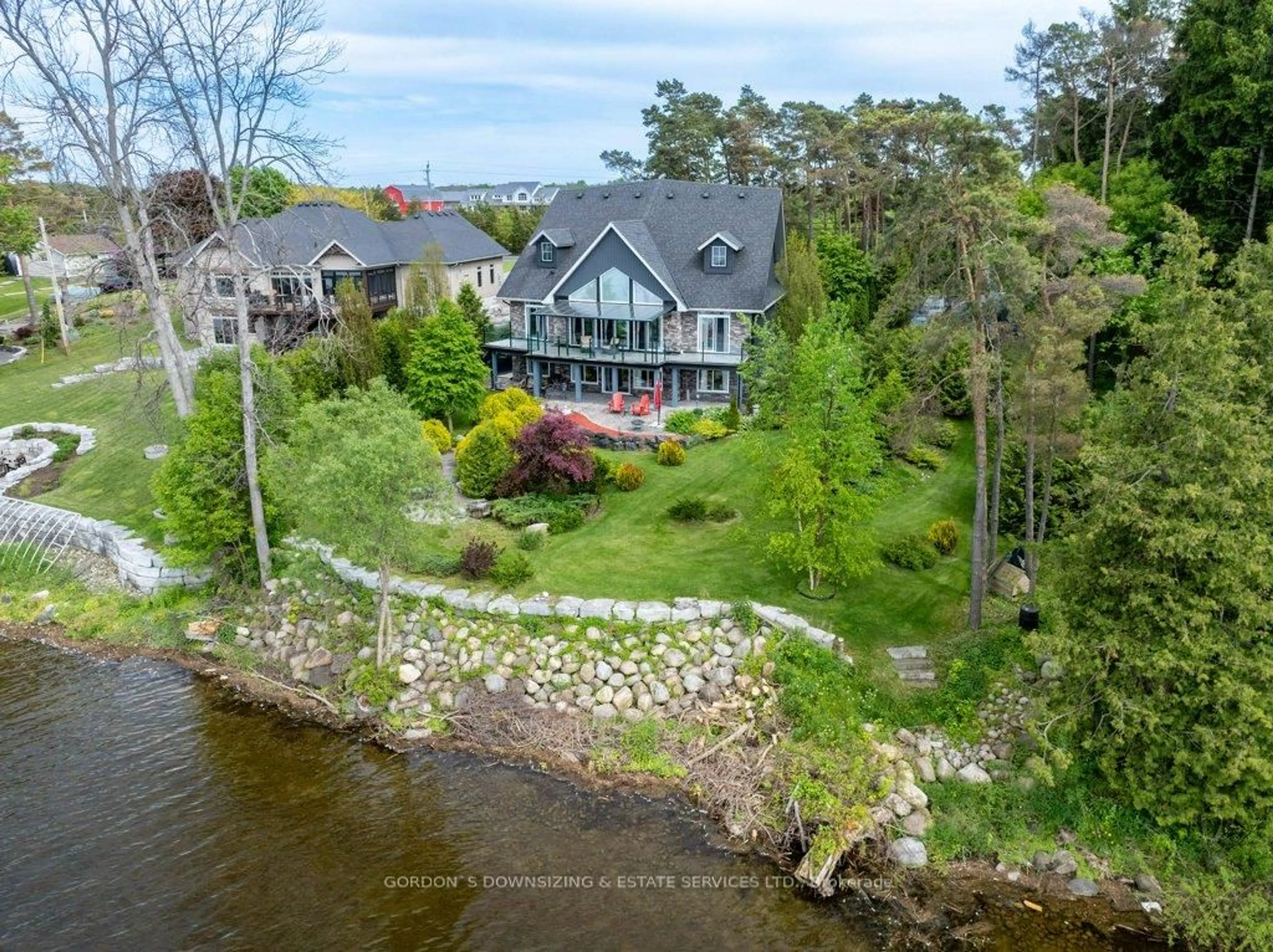 A pic from outside/outdoor area/front of a property/back of a property/a pic from drone, water/lake/river/ocean view for 3592 County 3 Rd, Prince Edward County Ontario K0K 1L0