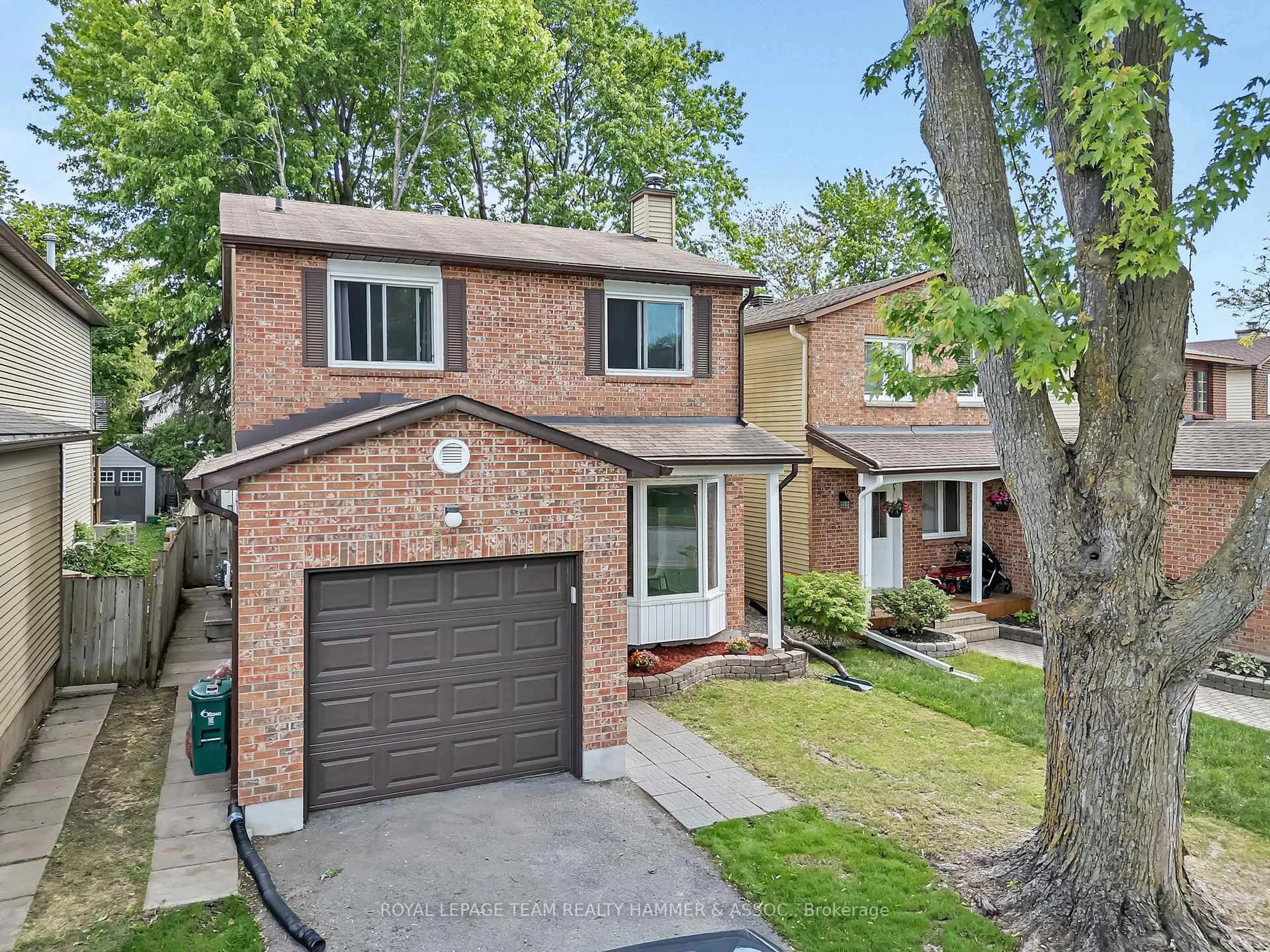 Home with brick exterior material, street for 217 Equestrian Dr, Ottawa Ontario K2M 1A5