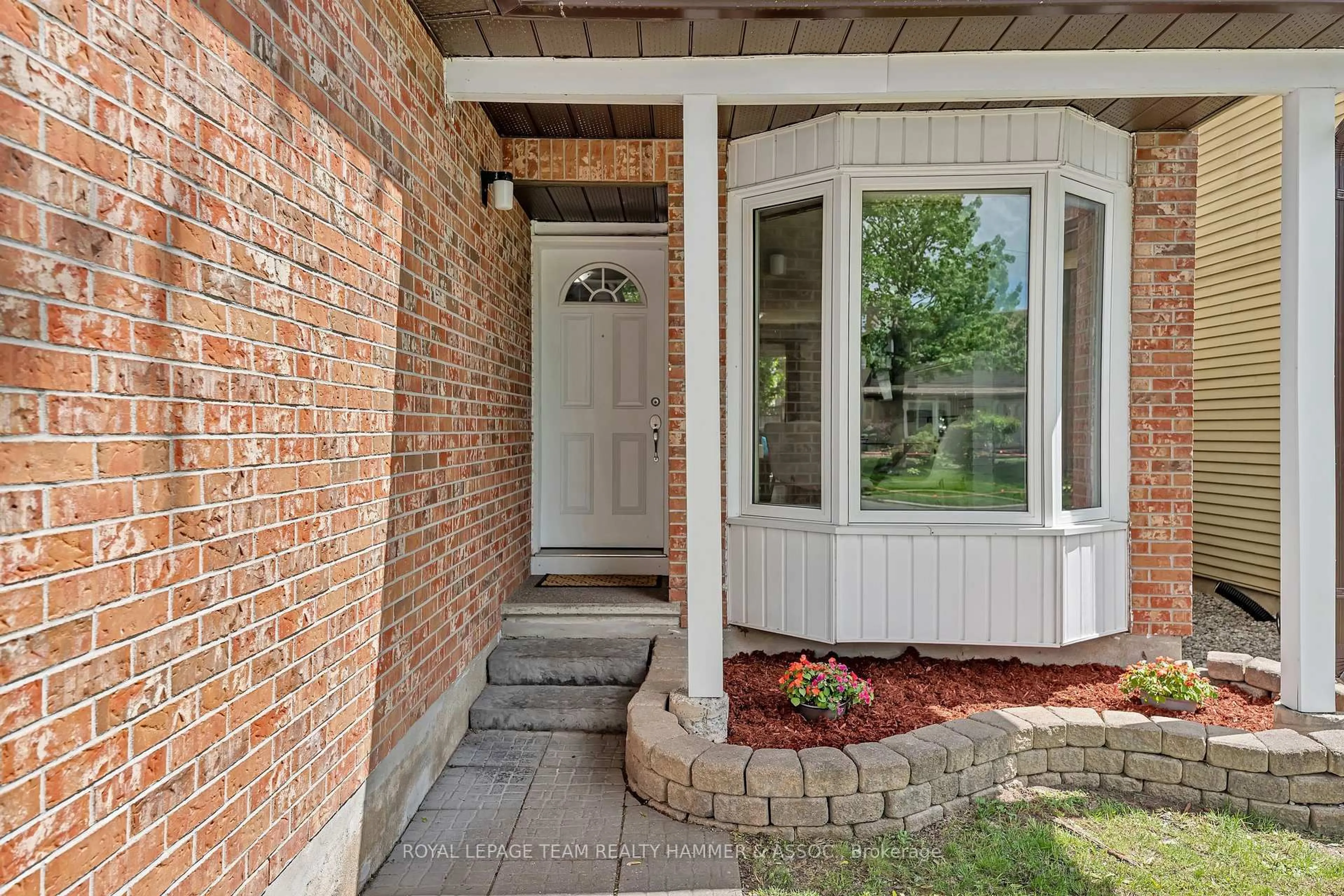 Home with brick exterior material, street for 217 Equestrian Dr, Ottawa Ontario K2M 1A5