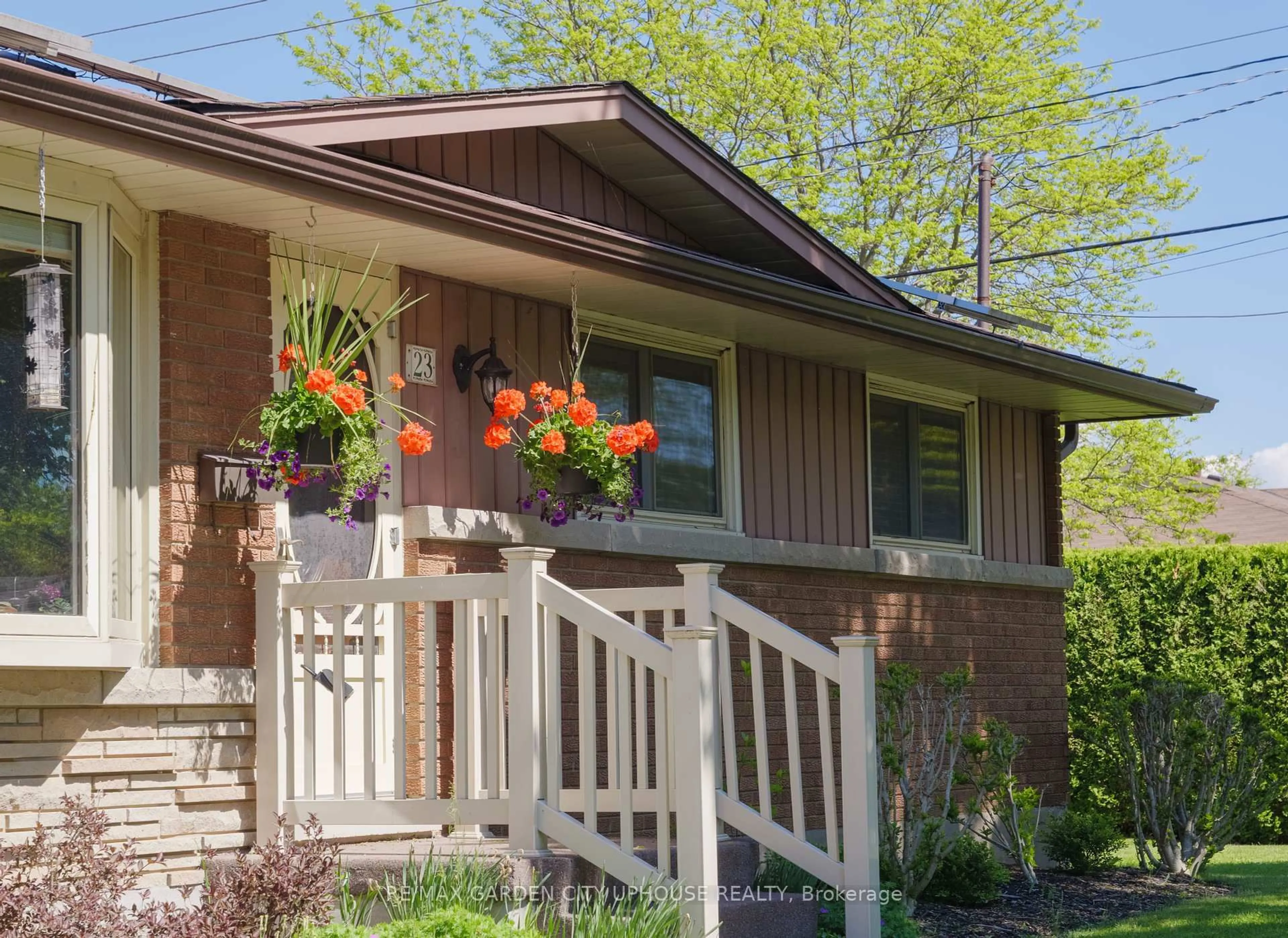 Home with vinyl exterior material, street for 23 Baker Rd, St. Catharines Ontario L2N 2V9