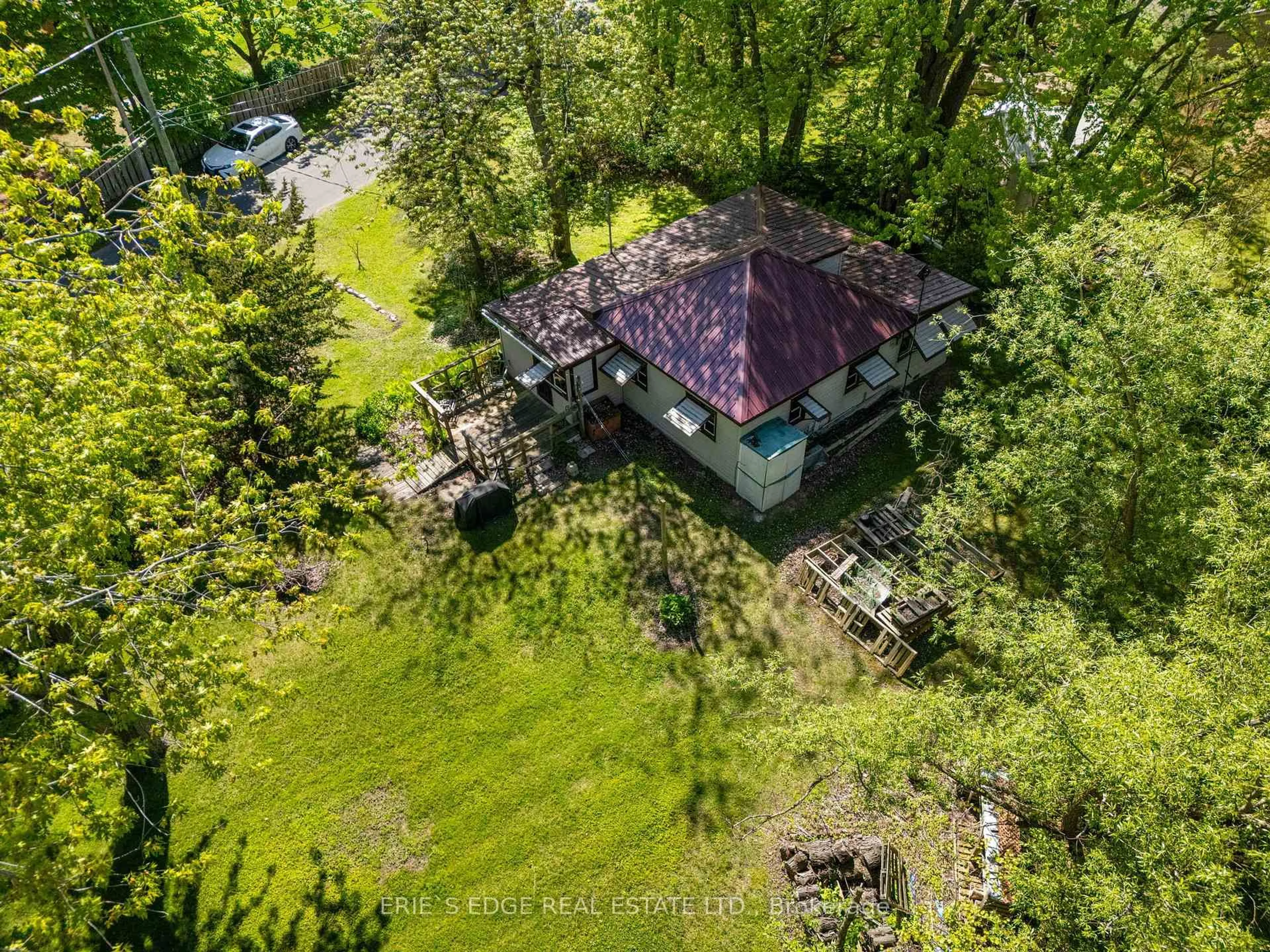 A pic from outside/outdoor area/front of a property/back of a property/a pic from drone, forest/trees view for 303 Erie Blvd, Norfolk Ontario N0E 1M0