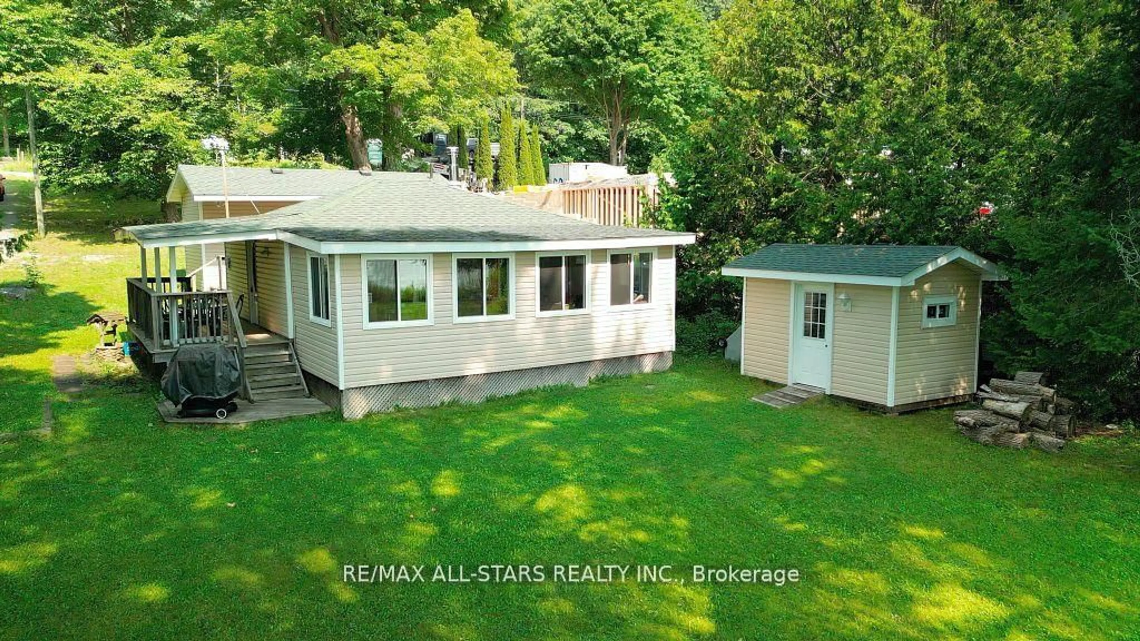 A pic from outside/outdoor area/front of a property/back of a property/a pic from drone, unknown for 136 Coldstream Rd, Kawartha Lakes Ontario K0M 1N0