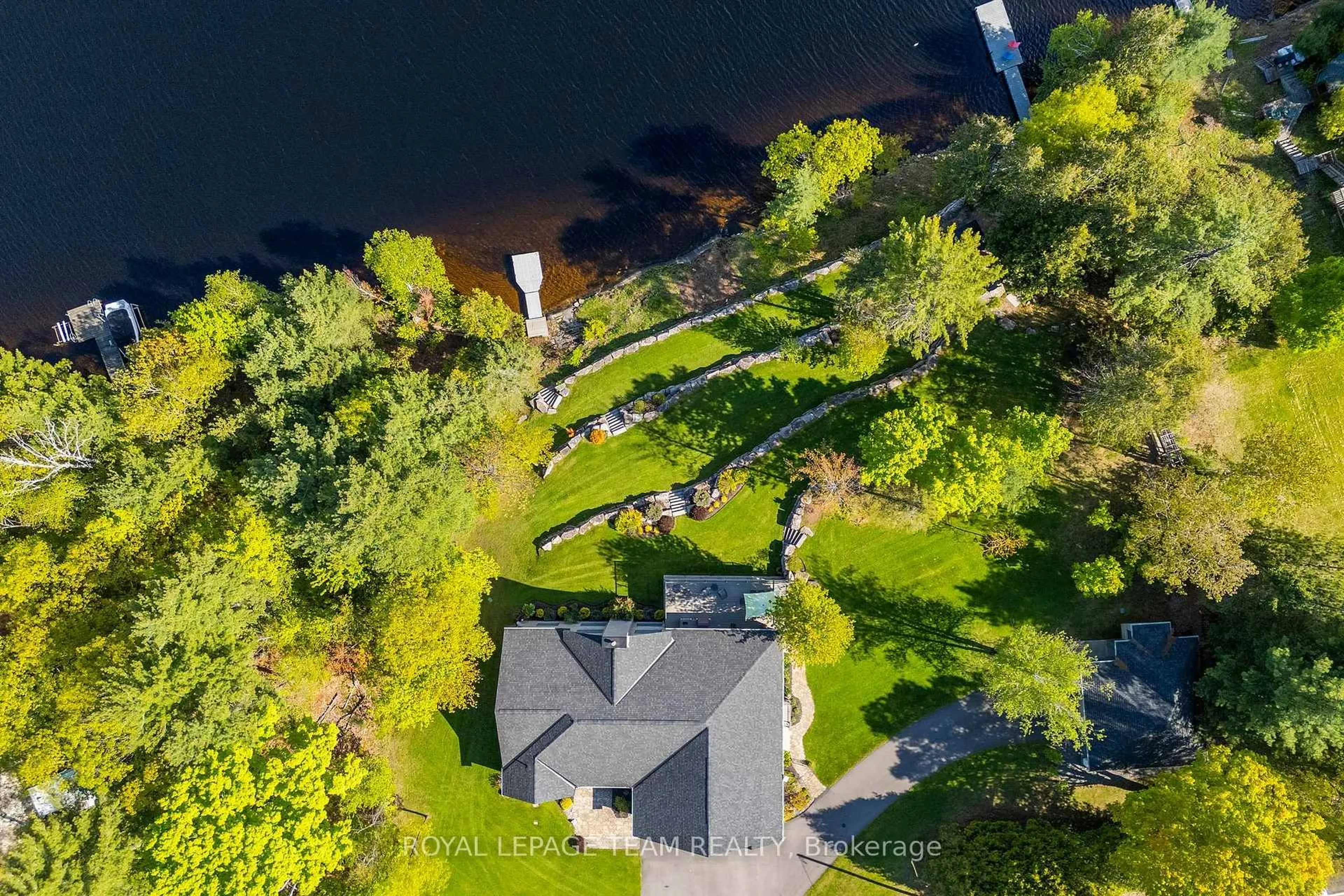 A pic from outside/outdoor area/front of a property/back of a property/a pic from drone, water/lake/river/ocean view for 2803 Centennial Lake Rd, Calabogie Ontario K0J 1H0