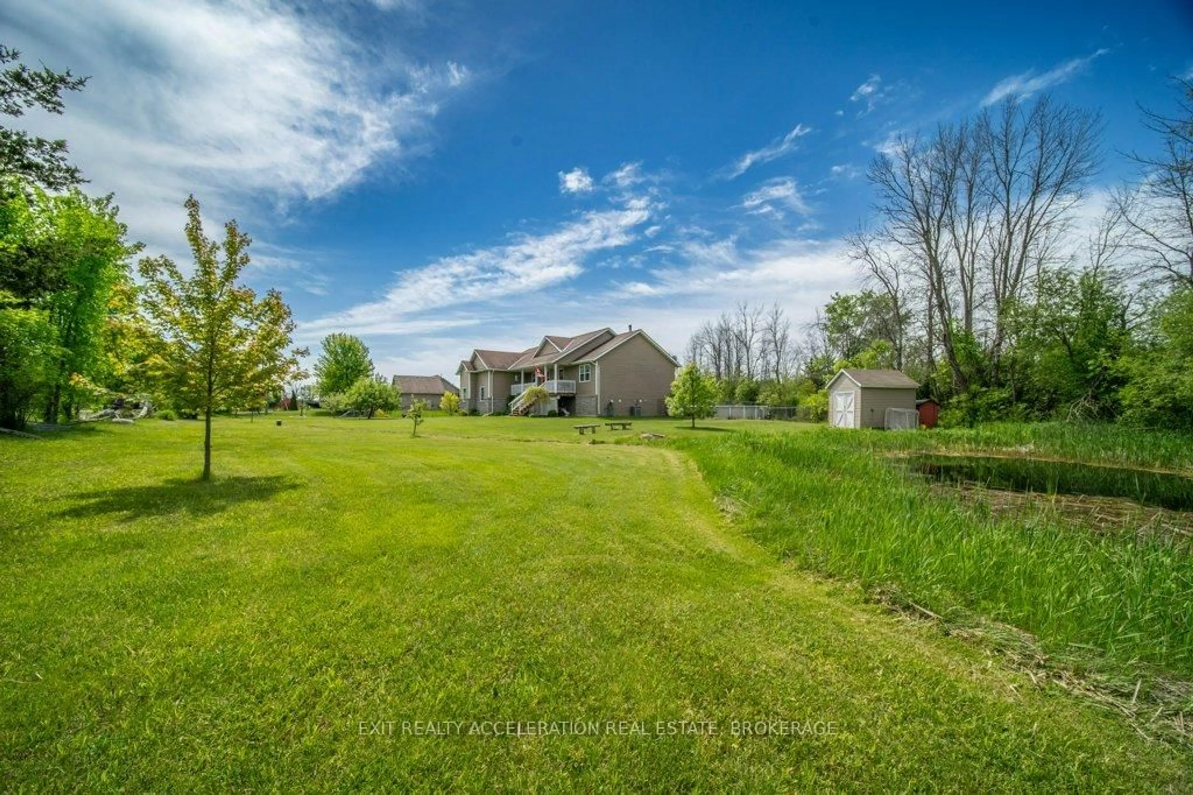 A pic from outside/outdoor area/front of a property/back of a property/a pic from drone, water/lake/river/ocean view for 405 Brennan Rd, Belleville Ontario K8N 4Z6