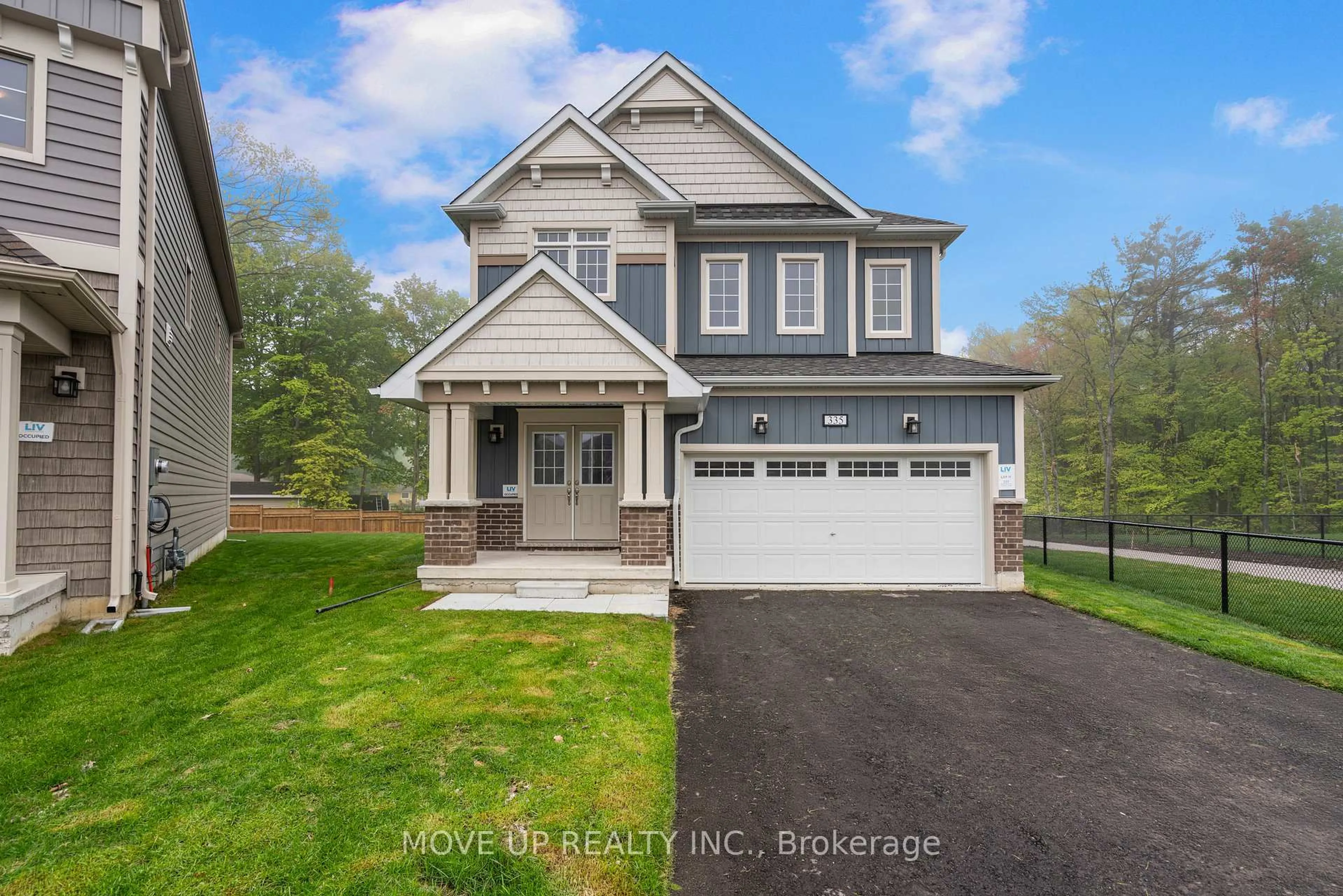 Home with vinyl exterior material, street for 335 Beechwood Forest Lane, Gravenhurst Ontario P1P 0H8