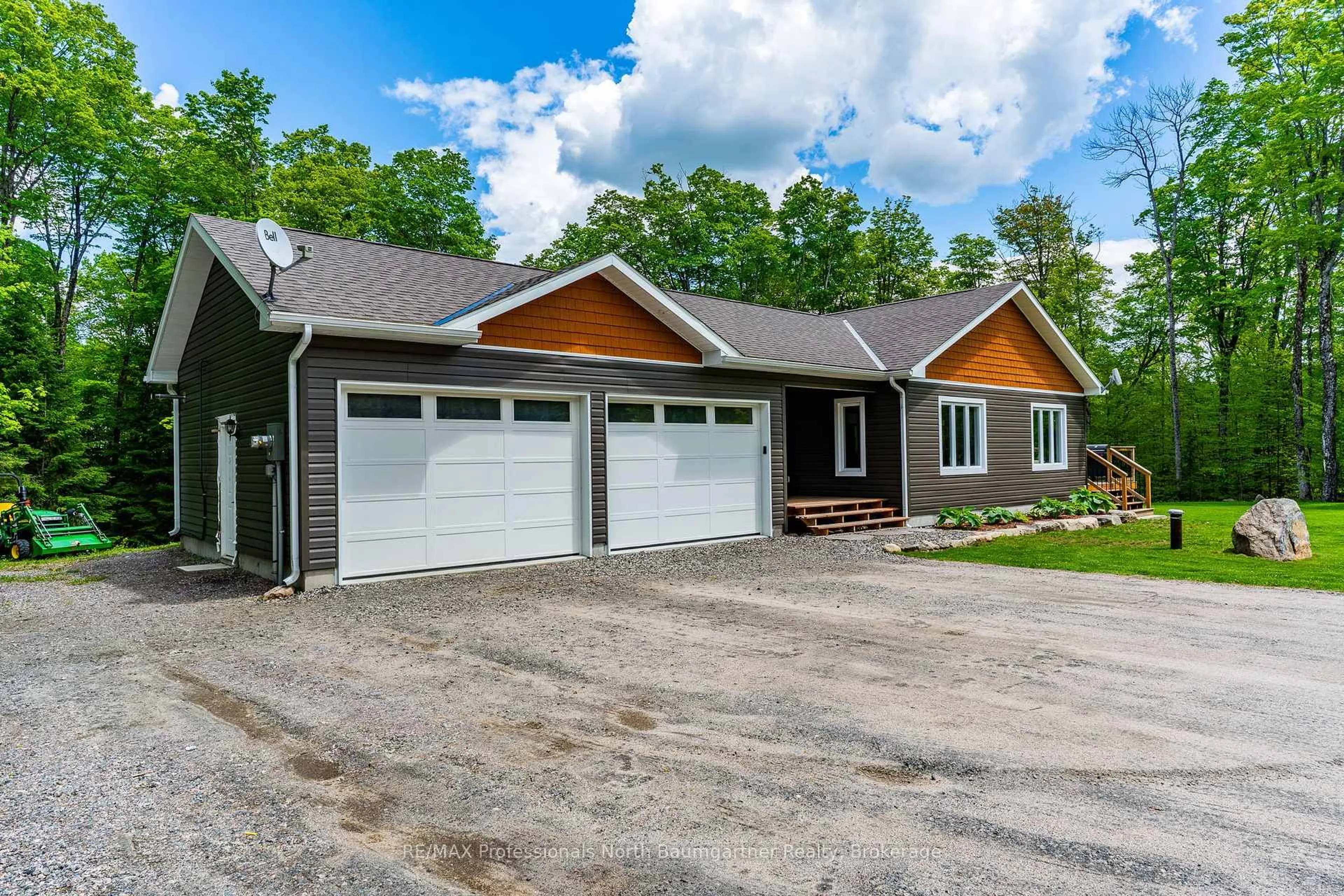 Home with vinyl exterior material, street for 1030 Hilltop Rd, Dysart et al Ontario K0M 1S0