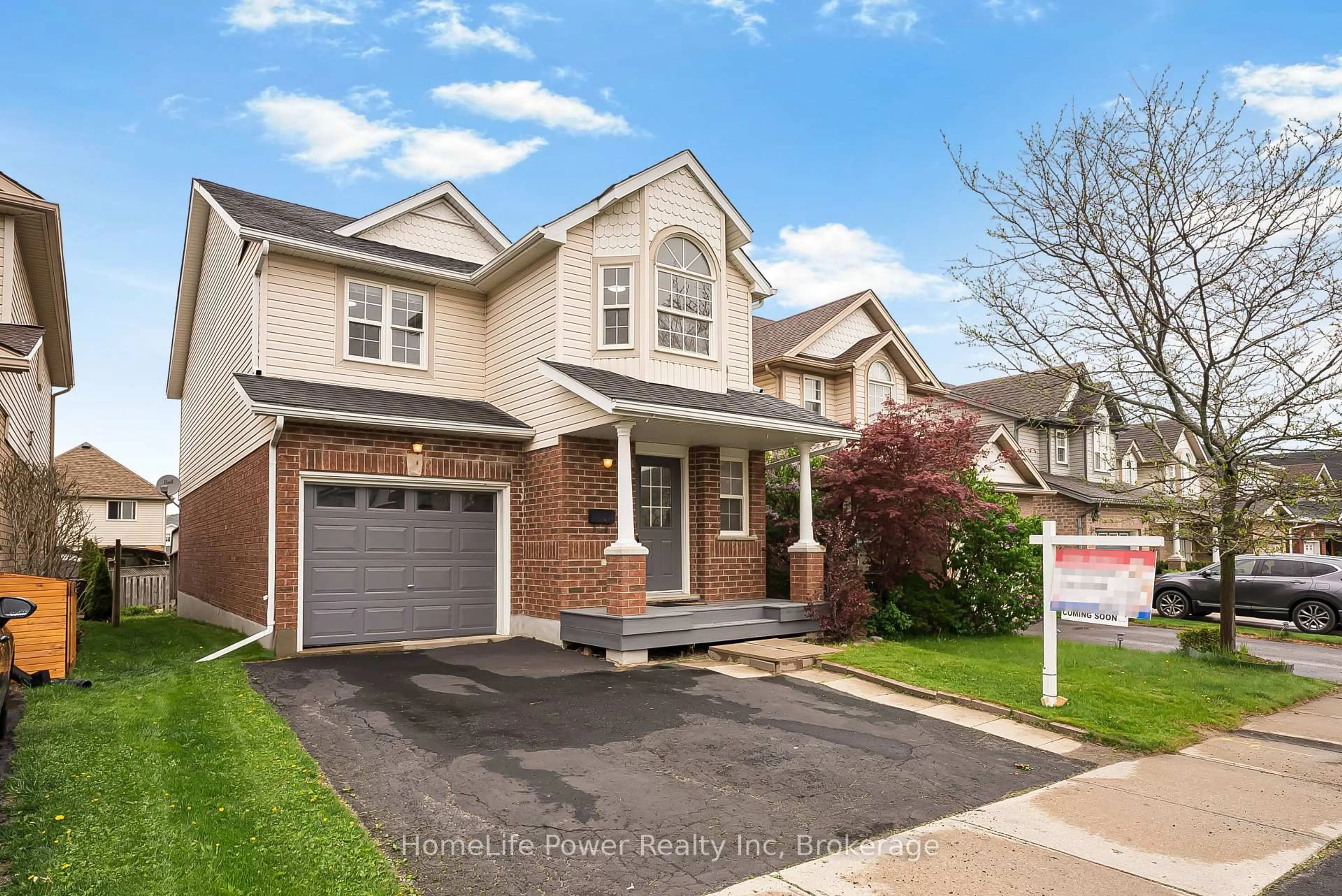 Home with brick exterior material, street for 74 Blue Lace Cres, Kitchener Ontario N2E 3X1