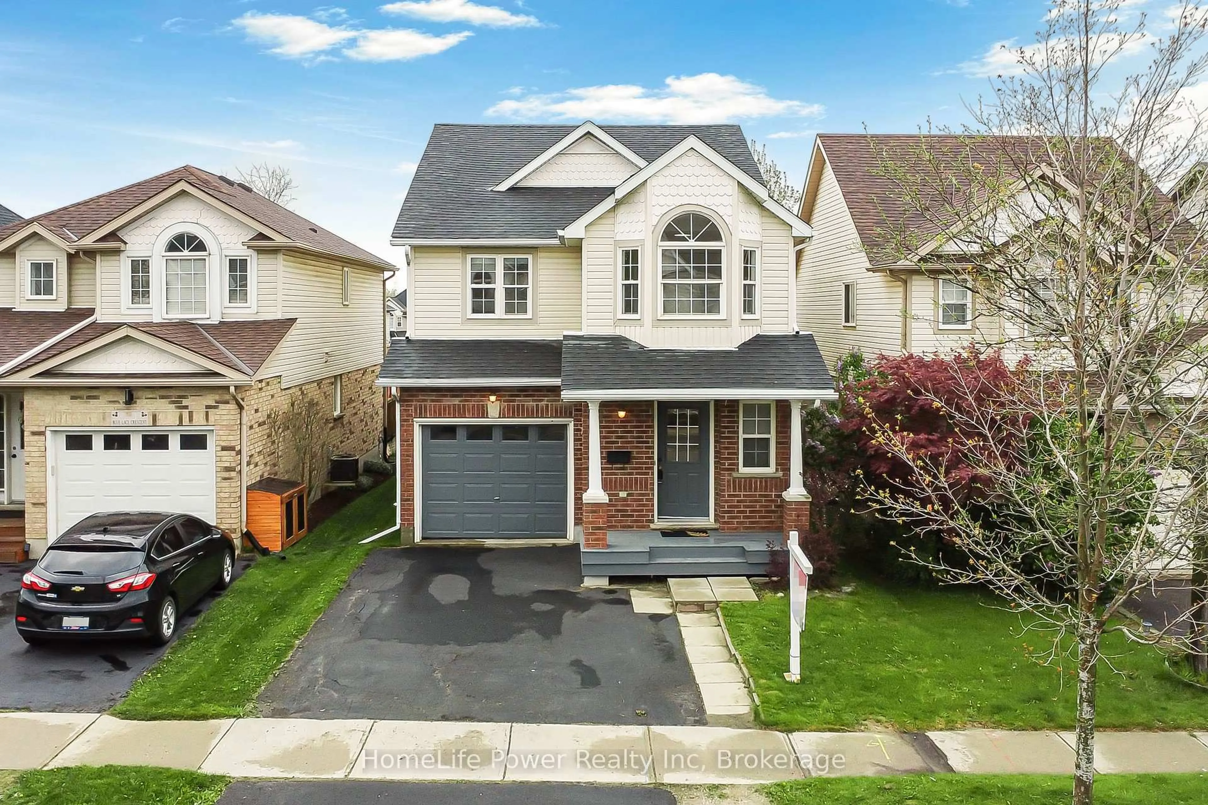 Home with vinyl exterior material, street for 74 Blue Lace Cres, Kitchener Ontario N2E 3X1