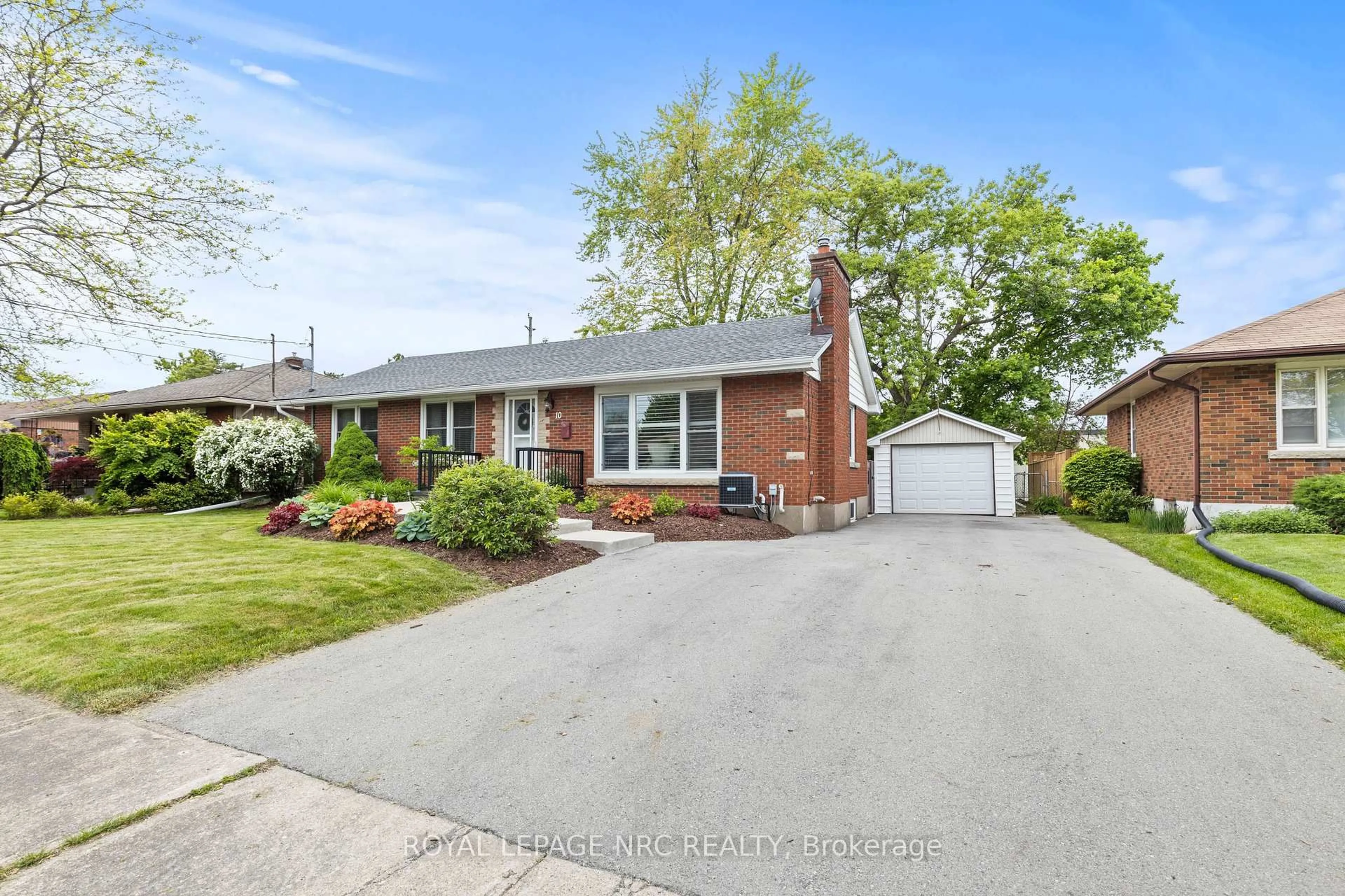 Home with brick exterior material, street for 10 Whiteoak Dr, St. Catharines Ontario L2M 3B4