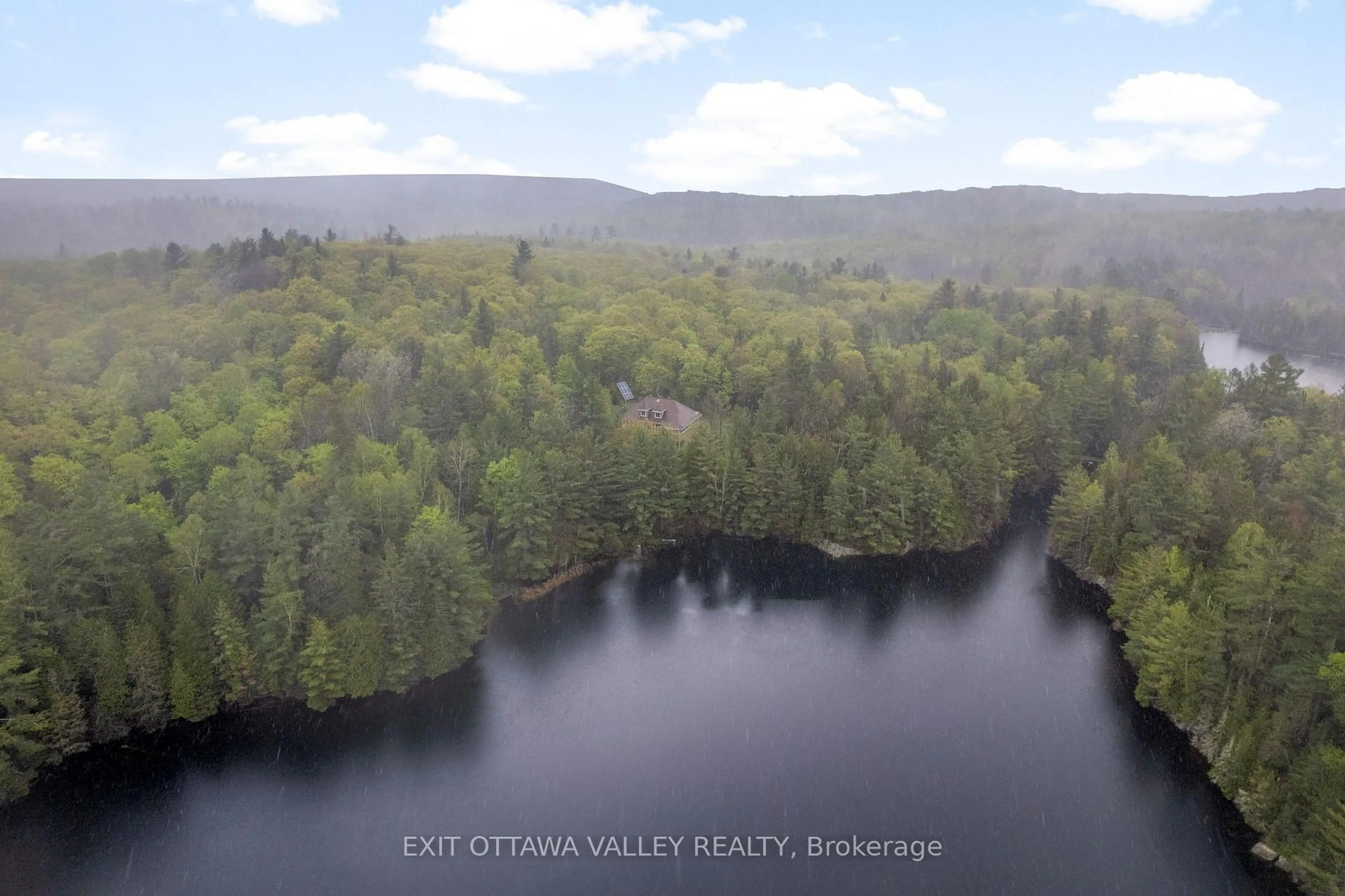A pic from outside/outdoor area/front of a property/back of a property/a pic from drone, water/lake/river/ocean view for 28084 Highway 41 N/A, Dacre Ontario K0J 1N0