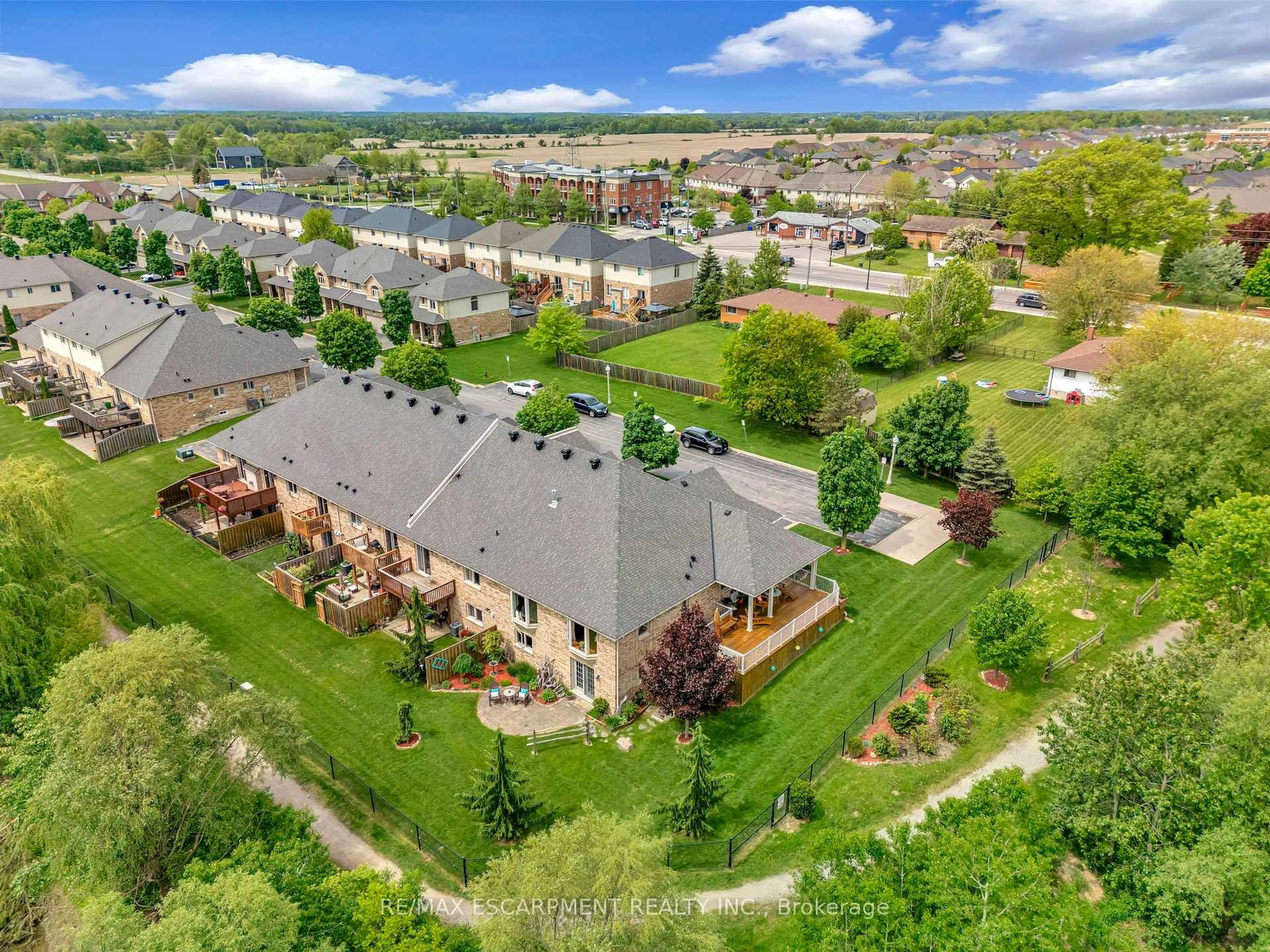 A pic from outside/outdoor area/front of a property/back of a property/a pic from drone, mountain view for 310 Southbrook Dr #10, Hamilton Ontario L0R 1C0