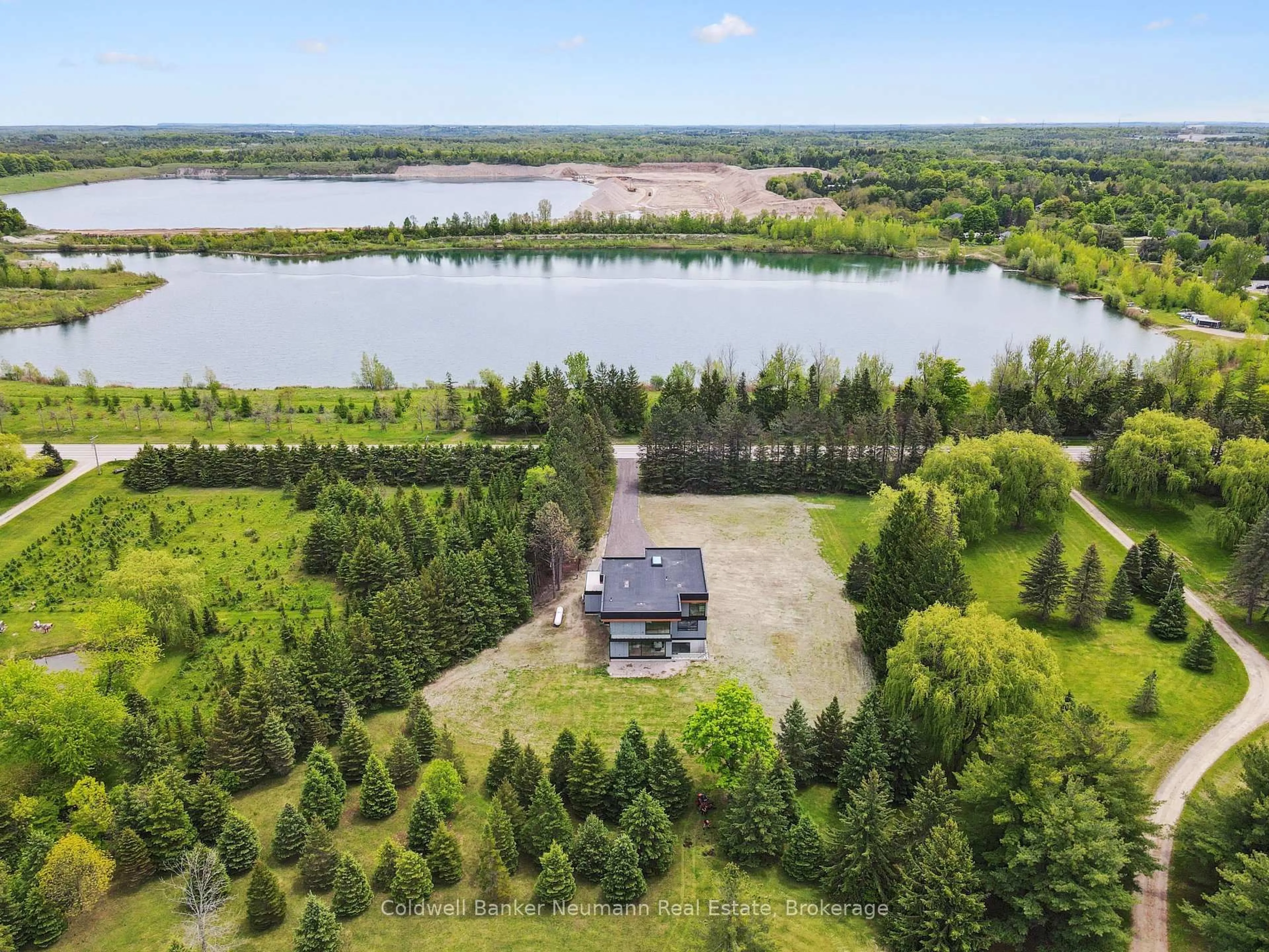 A pic from outside/outdoor area/front of a property/back of a property/a pic from drone, water/lake/river/ocean view for 7638 Wellington Road 34 Rd, Puslinch Ontario N0B 2J0