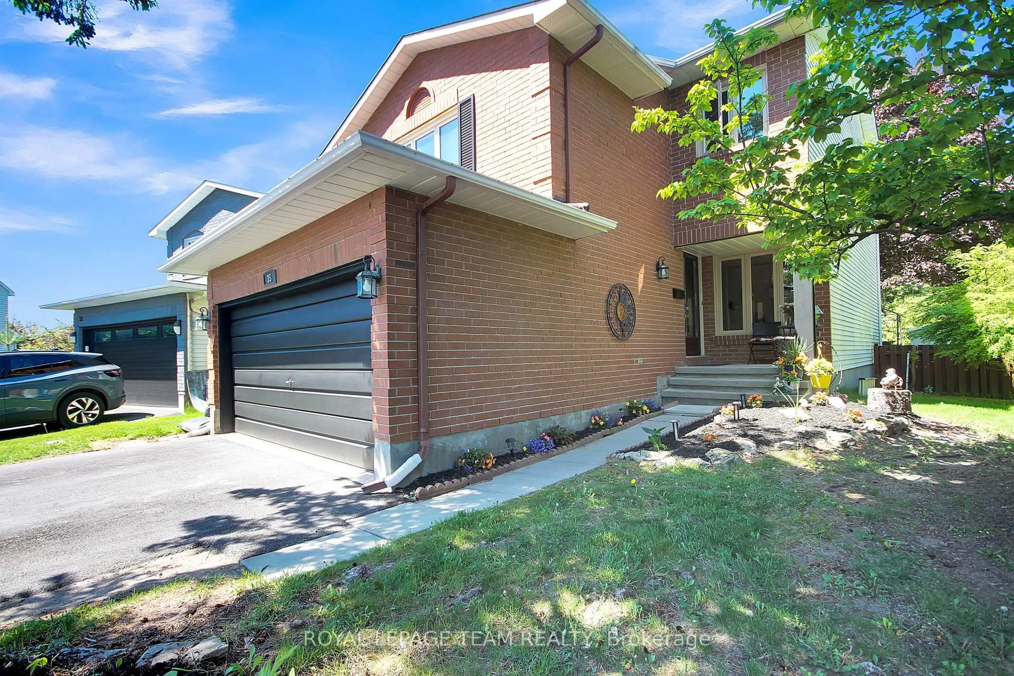 Home with brick exterior material, street for 35 Longden Pl, Ottawa Ontario K2M 1V3