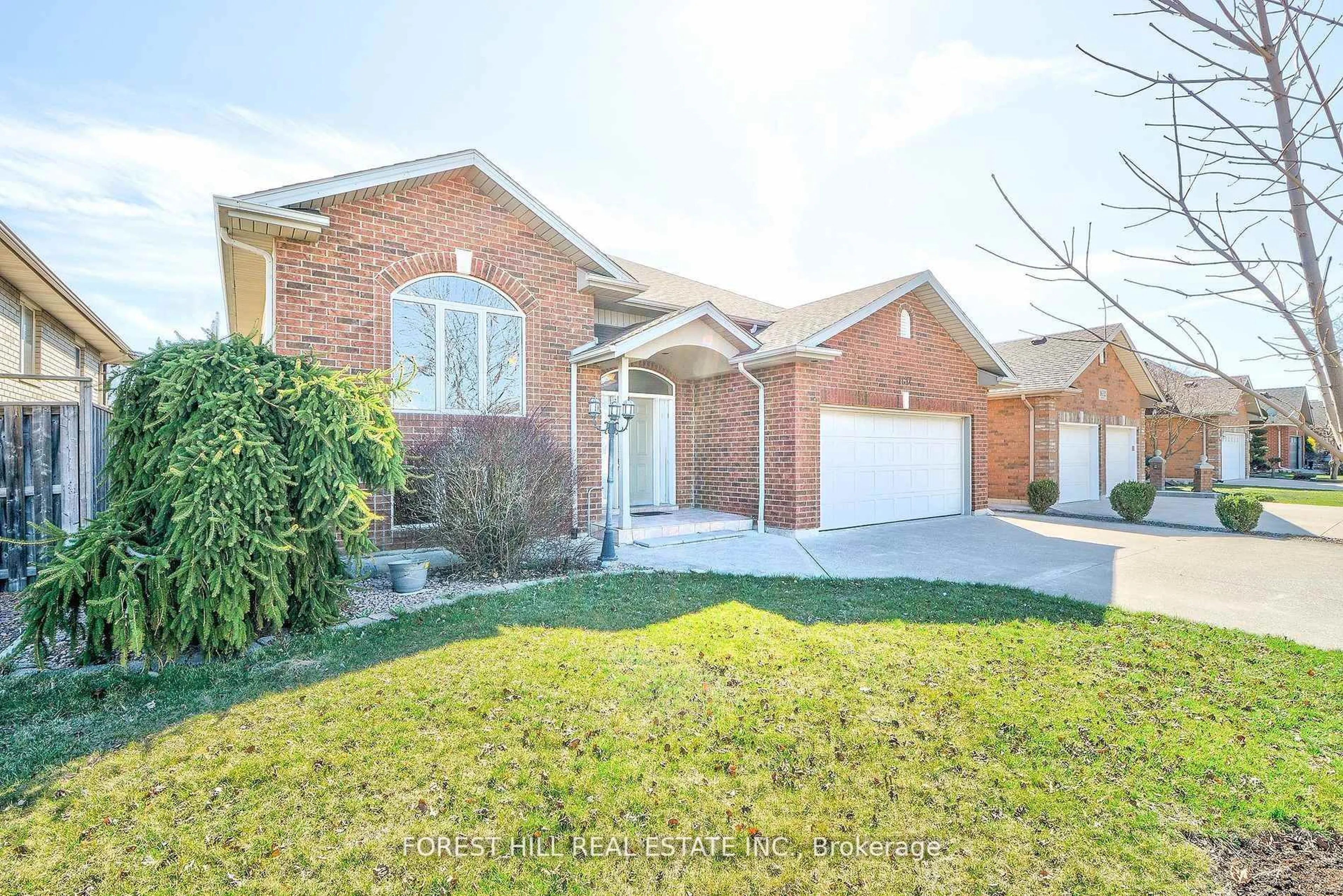 Home with brick exterior material, street for 1614 Morningstar Ave, Windsor Ontario N8P 1P9