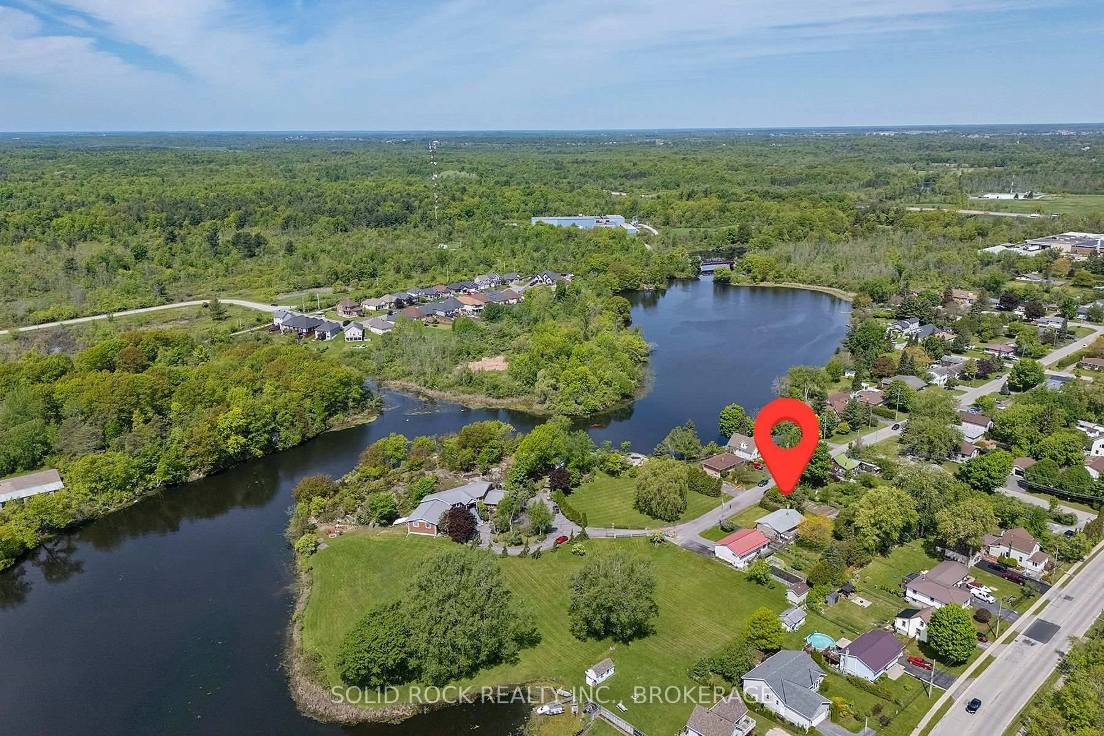 A pic from outside/outdoor area/front of a property/back of a property/a pic from drone, water/lake/river/ocean view for 565 Queen St, Gananoque Ontario K7G 2A9