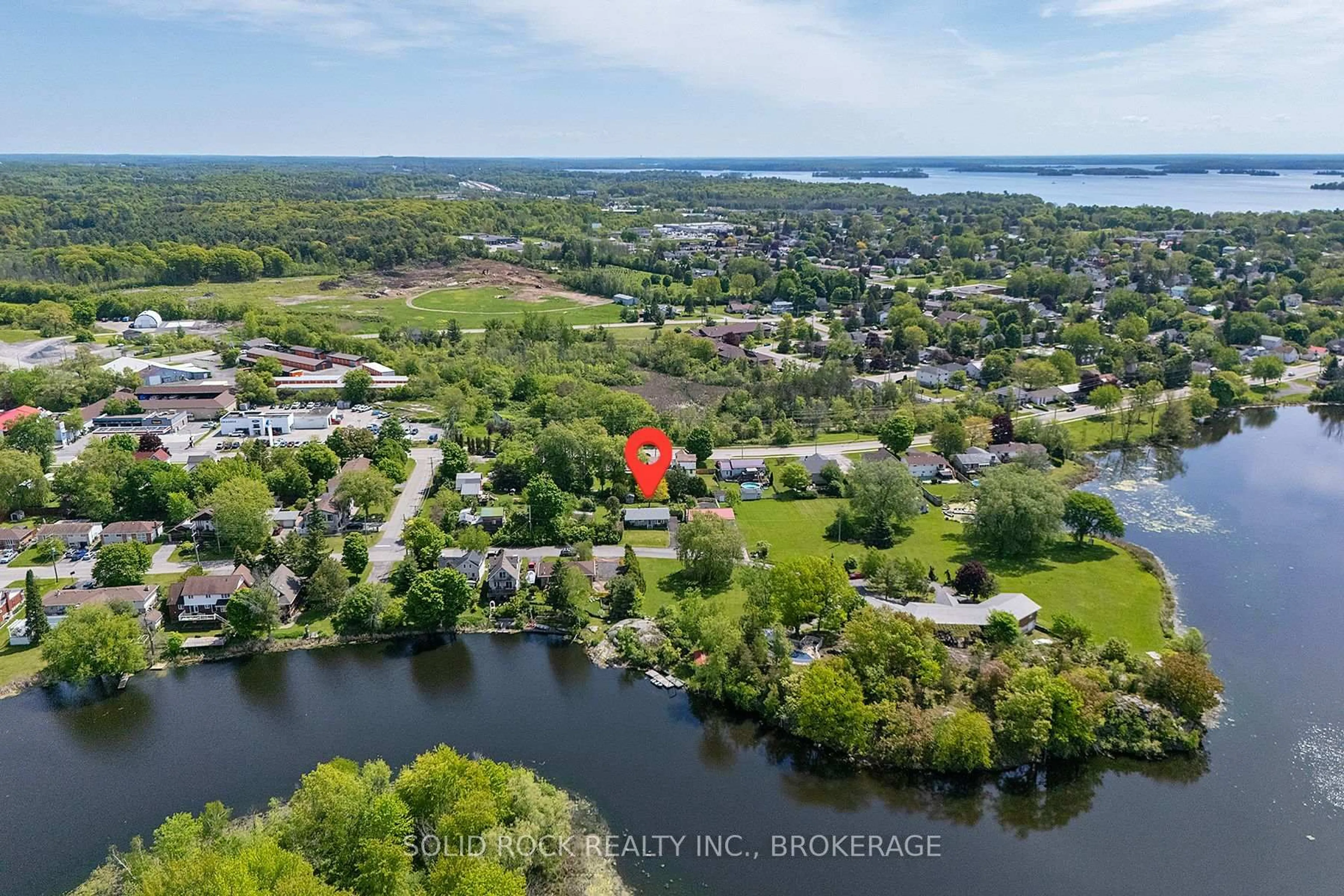 A pic from outside/outdoor area/front of a property/back of a property/a pic from drone, water/lake/river/ocean view for 565 Queen St, Gananoque Ontario K7G 2A9