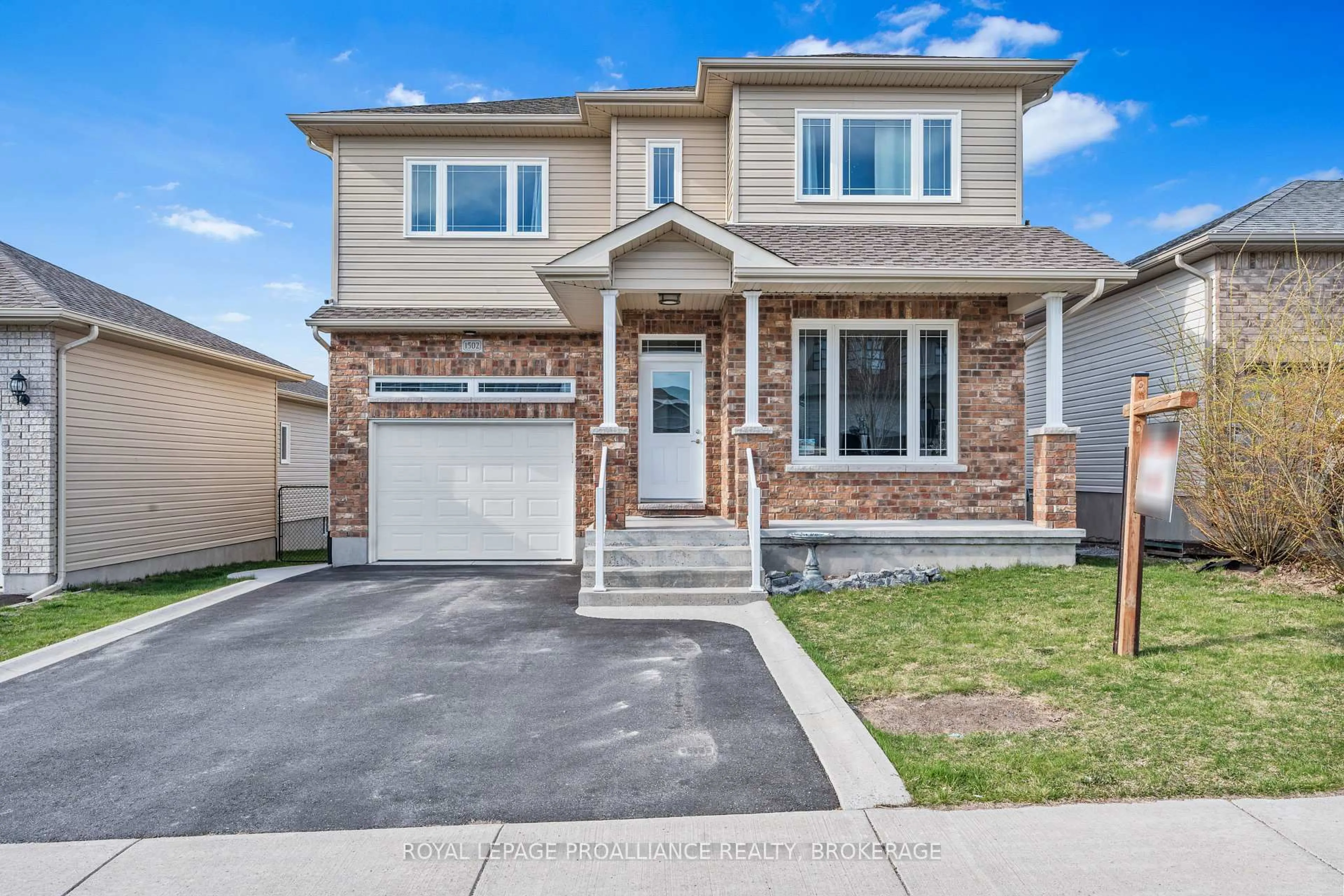 Home with brick exterior material, street for 1502 Clover St, Kingston Ontario K7P 0M9