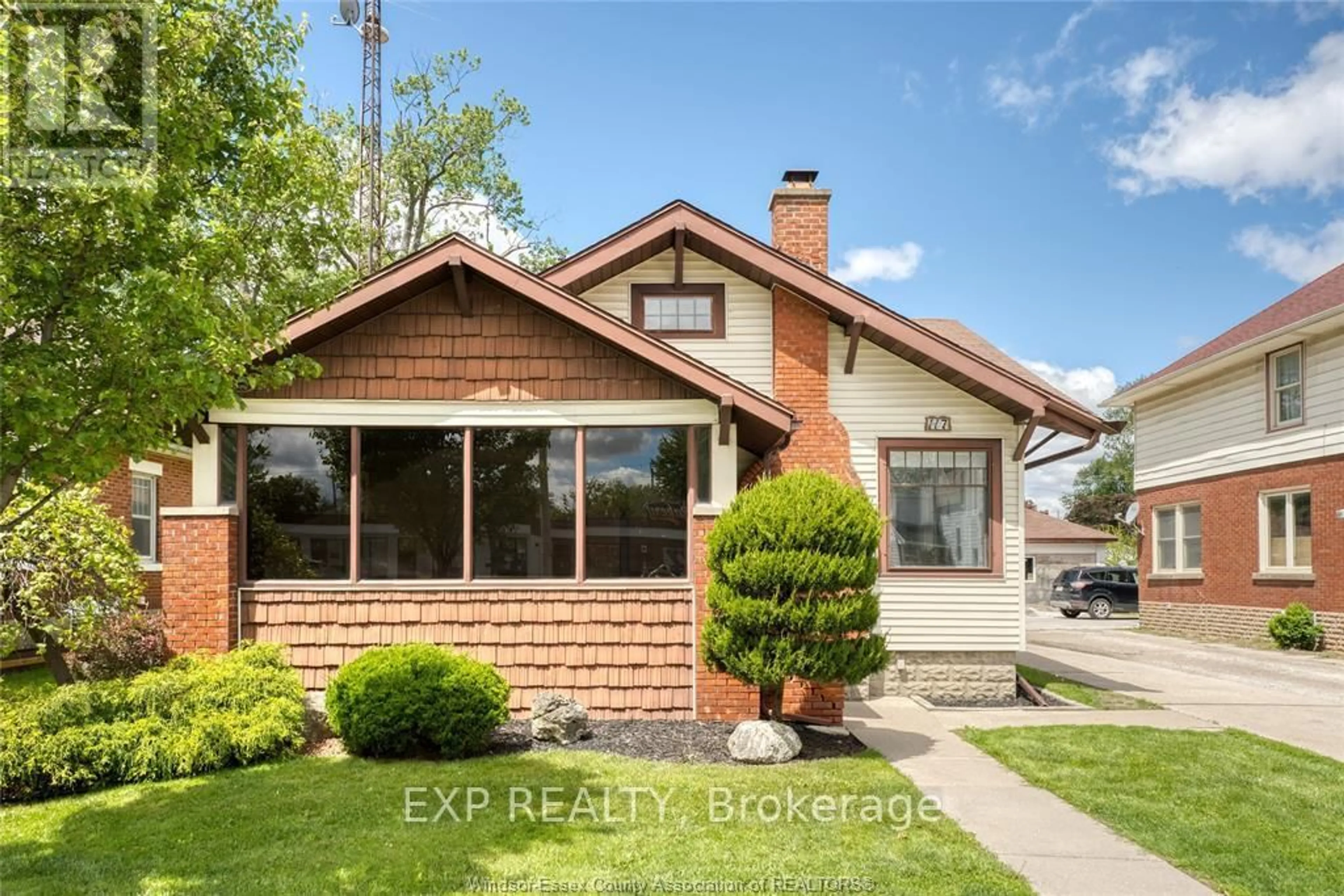 Home with brick exterior material, street for 117 Erie St, Leamington Ontario N8H 3B5
