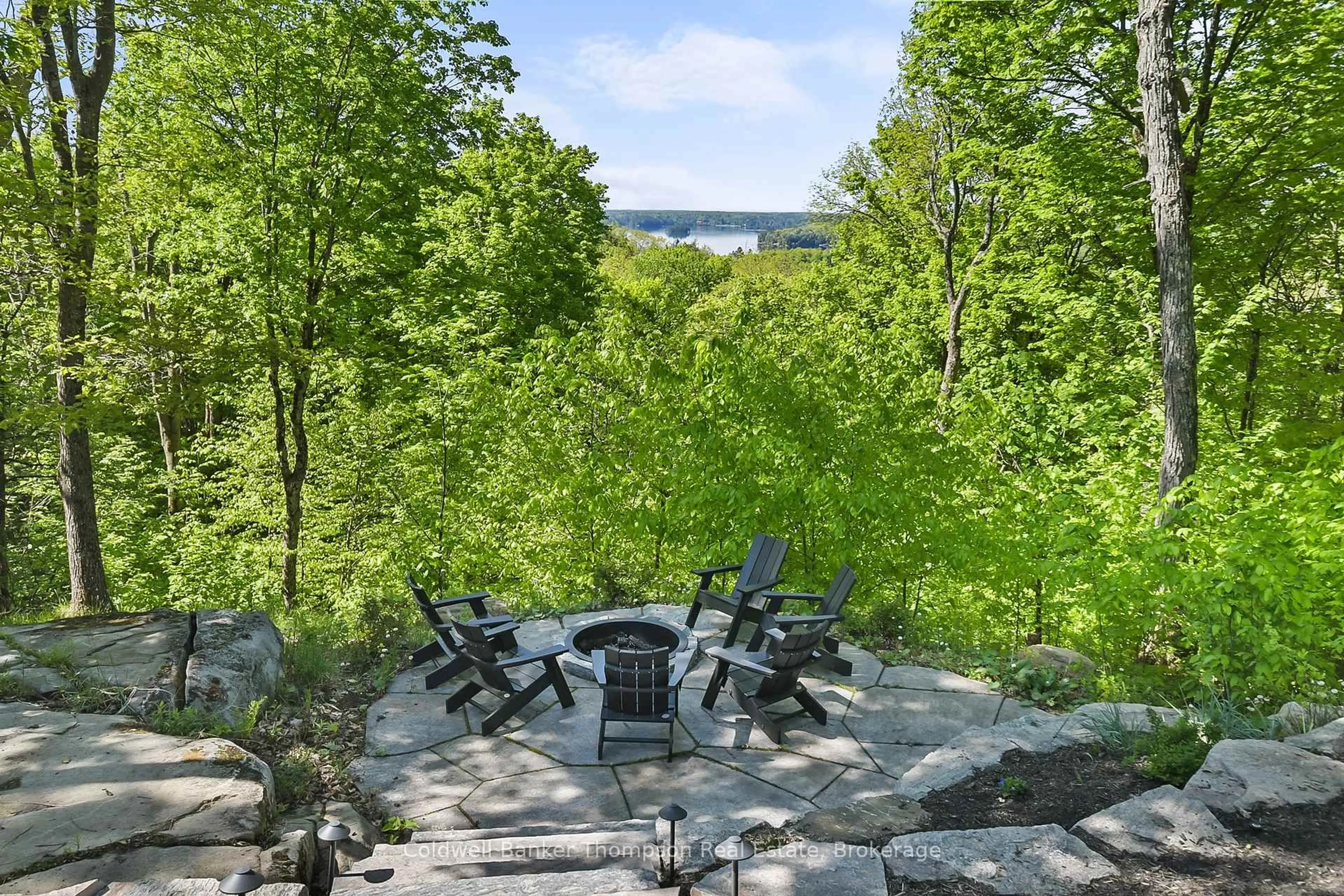 Patio, forest/trees view for 100 Gryffin Bluffs Lane #16, Huntsville Ontario P0B 1M0
