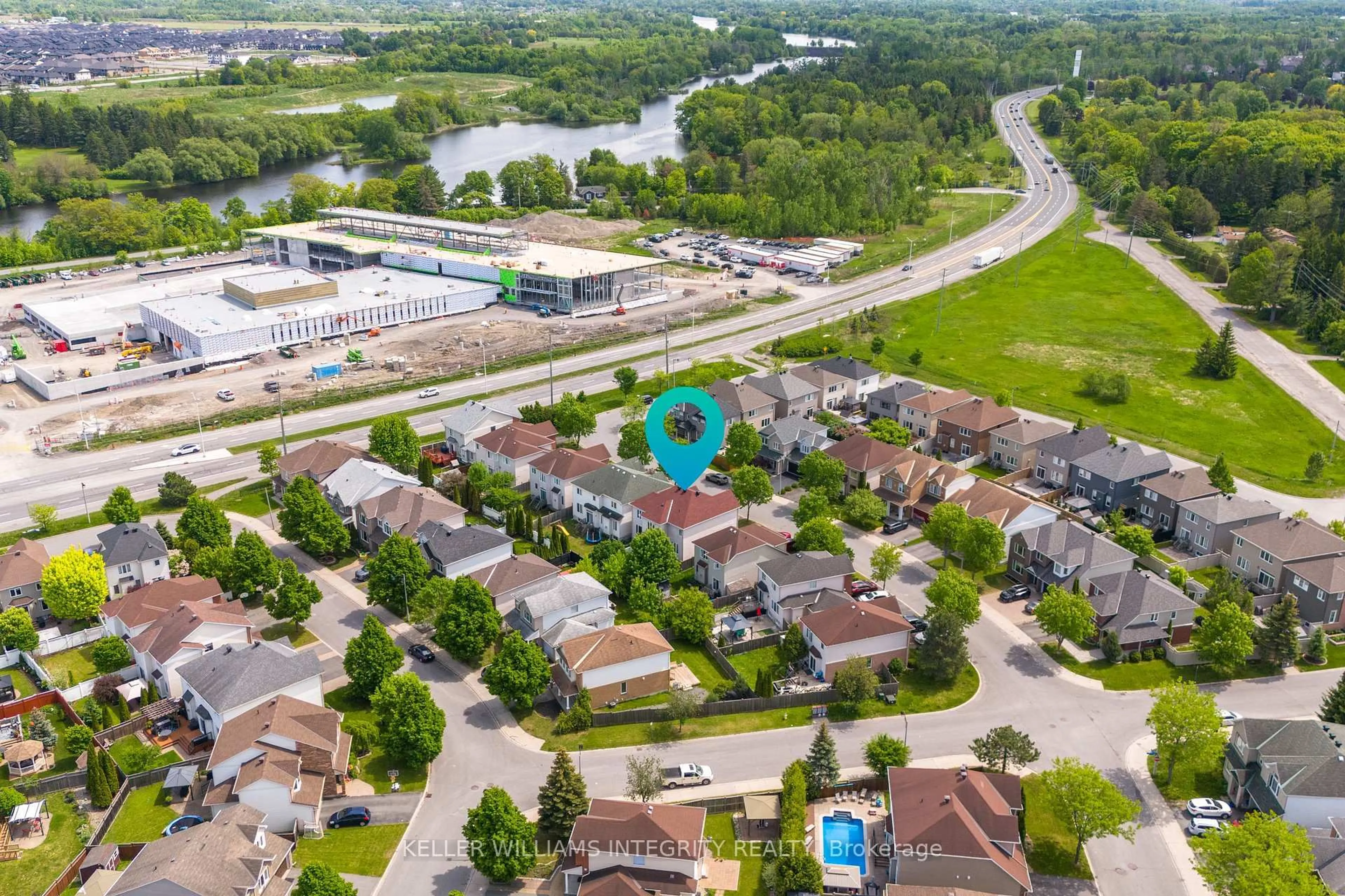 A pic from outside/outdoor area/front of a property/back of a property/a pic from drone, water/lake/river/ocean view for 119 Willow Creek Circ, Ottawa Ontario K2G 7A8