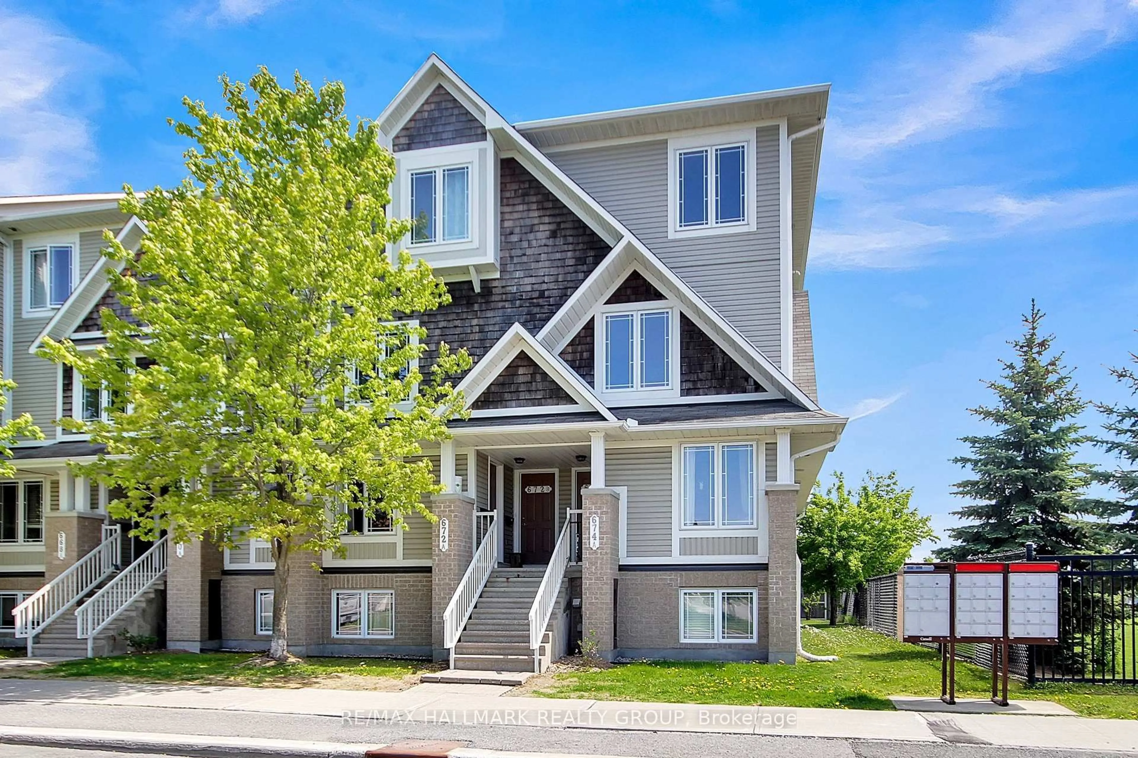 Home with brick exterior material, street for 674B Chapman Mills Dr #60, Ottawa Ontario K2J 3V2