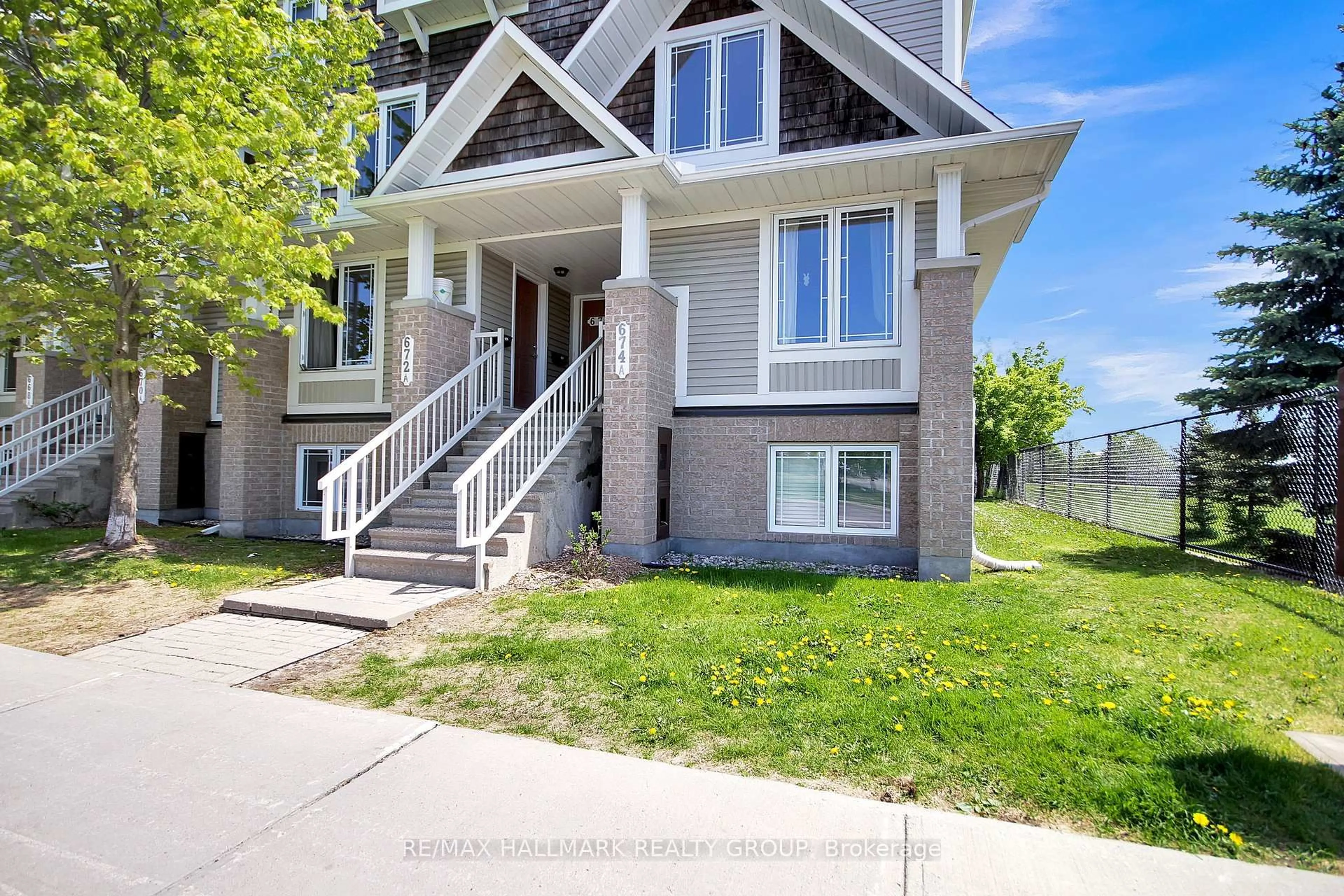 Home with brick exterior material, street for 674B Chapman Mills Dr #60, Ottawa Ontario K2J 3V2