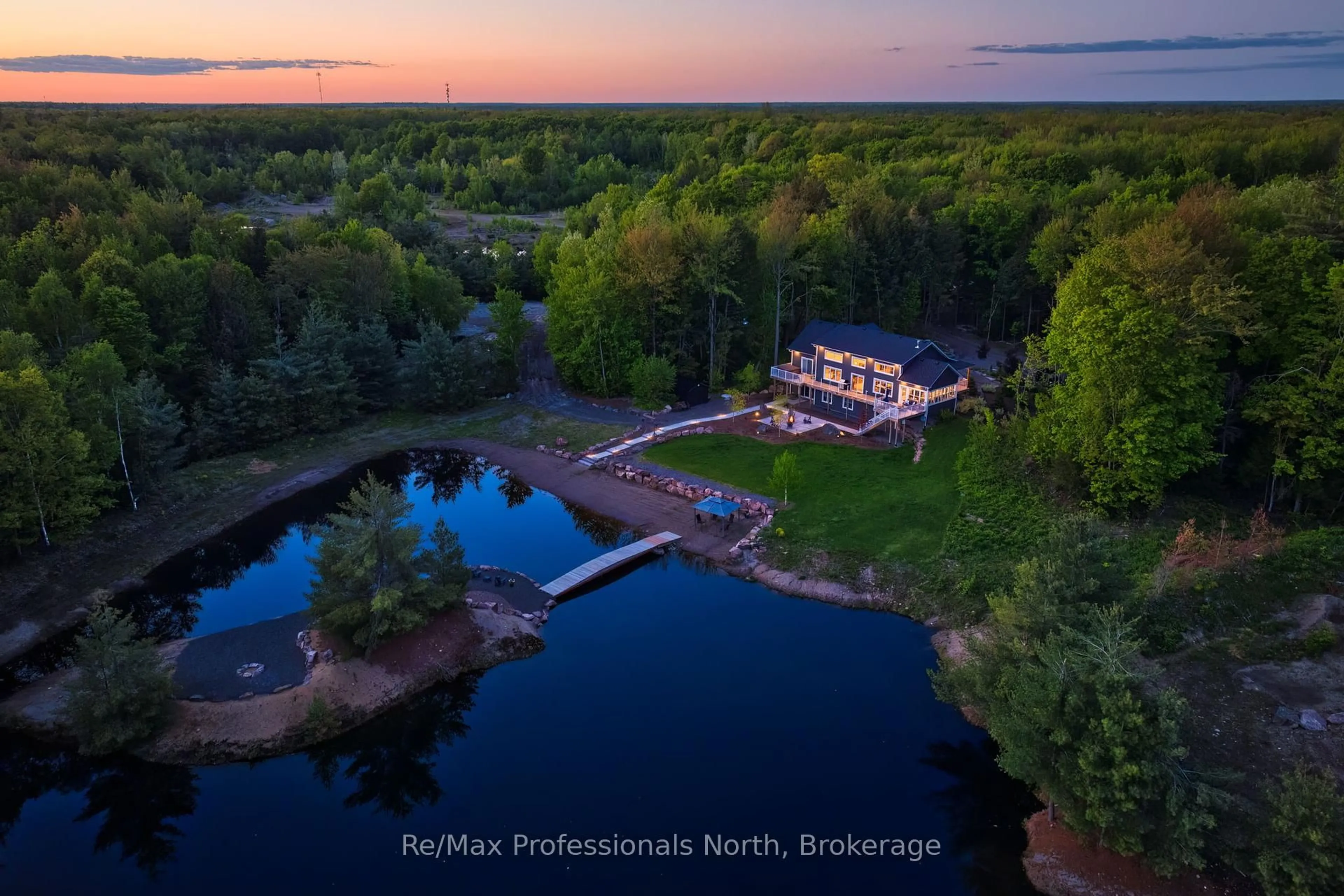 A pic from outside/outdoor area/front of a property/back of a property/a pic from drone, water/lake/river/ocean view for 1076 Xavier St, Gravenhurst Ontario P0E 1G0