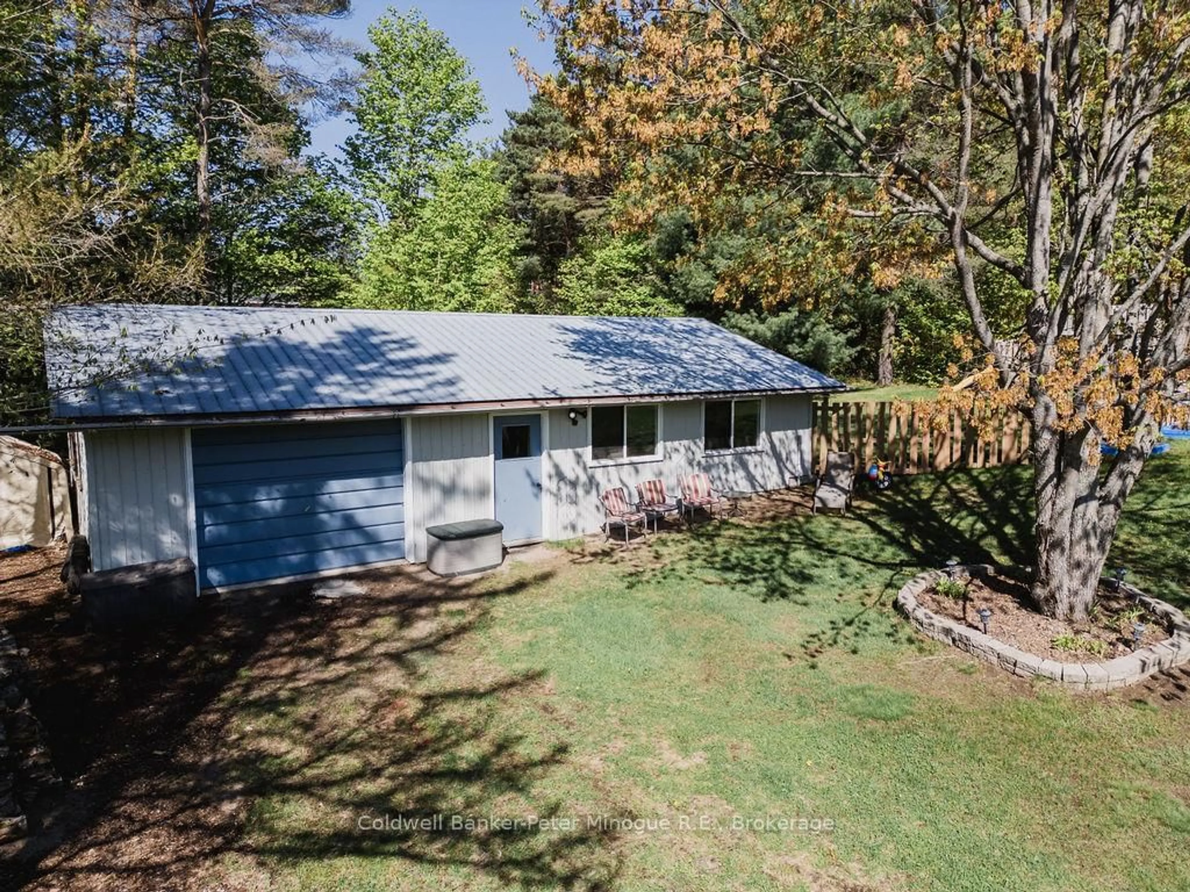 A pic from outside/outdoor area/front of a property/back of a property/a pic from drone, forest/trees view for 24 MURRAY St, Sundridge Ontario P0A 1Z0