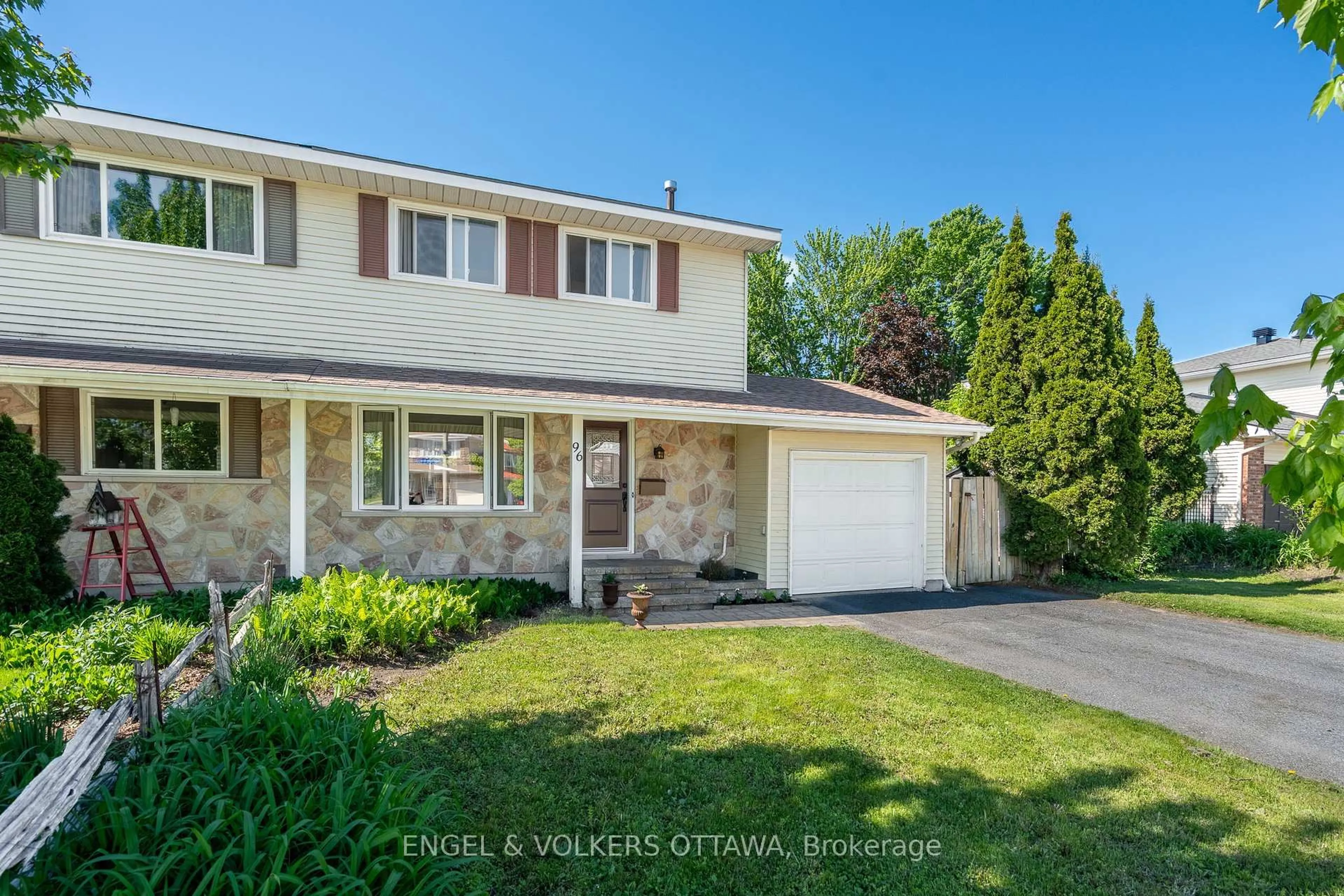 Home with vinyl exterior material, street for 96 Craig Henry Dr, Ottawa Ontario K2G 3Z7