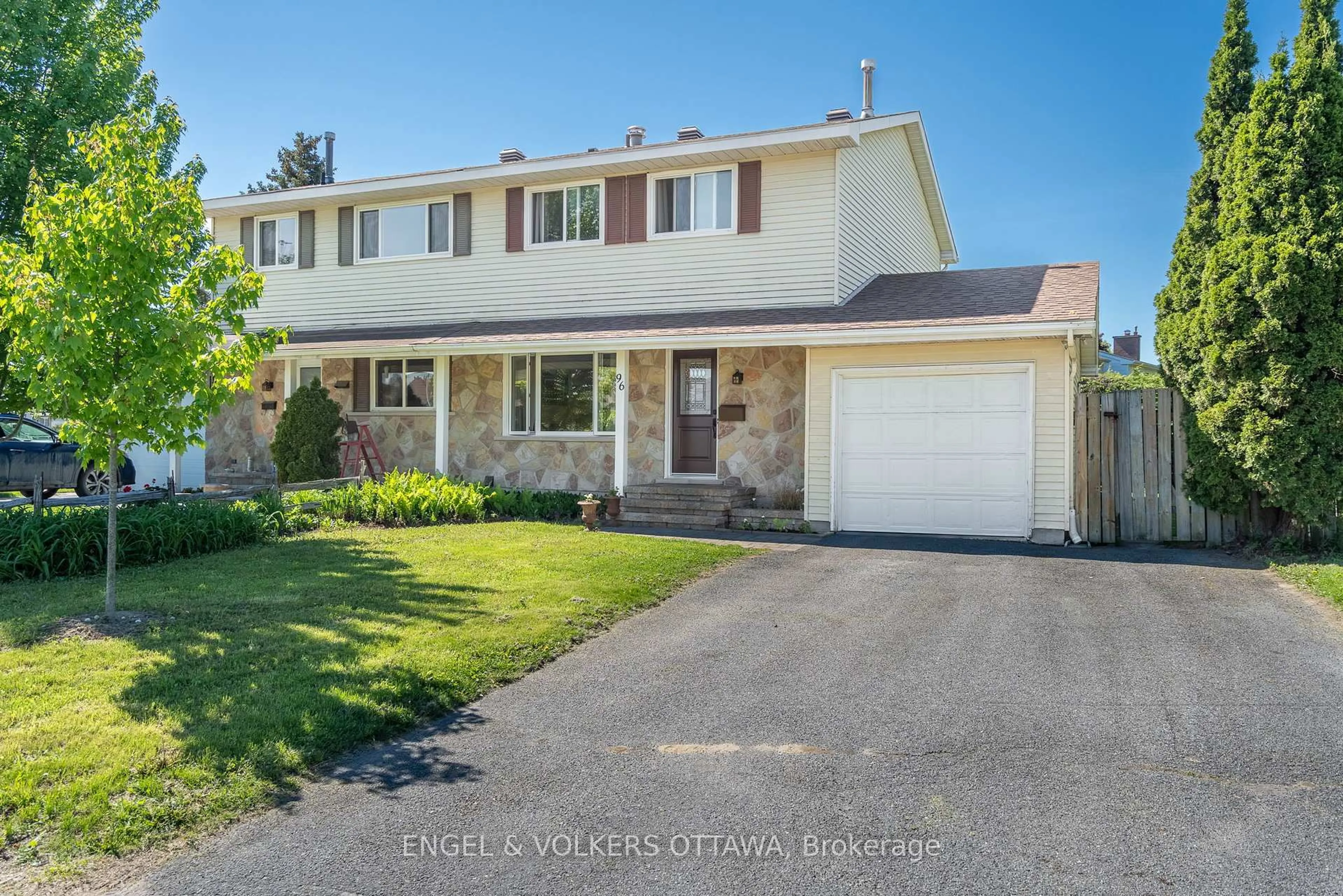 Home with vinyl exterior material, street for 96 Craig Henry Dr, Ottawa Ontario K2G 3Z7