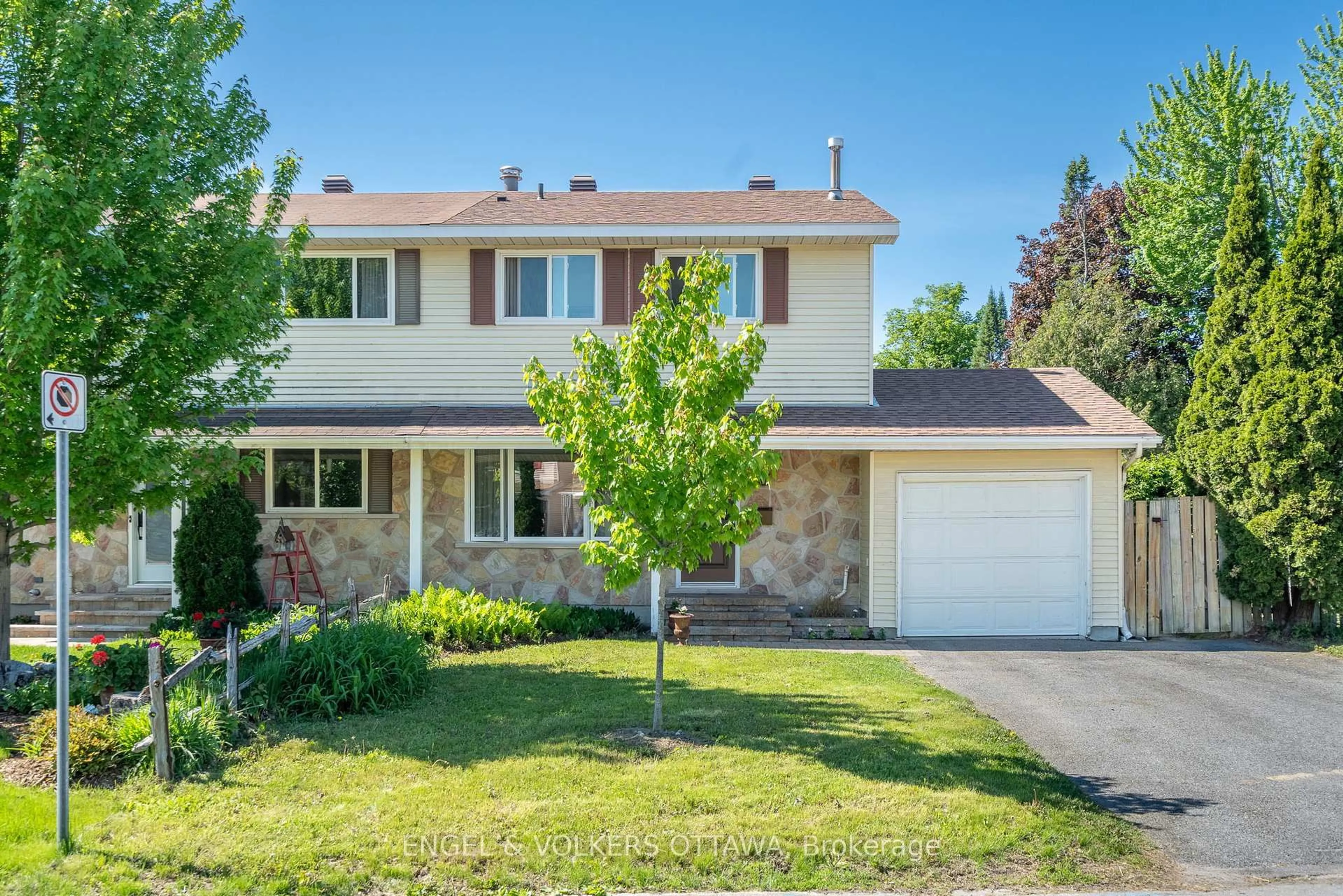 Home with vinyl exterior material, street for 96 Craig Henry Dr, Ottawa Ontario K2G 3Z7