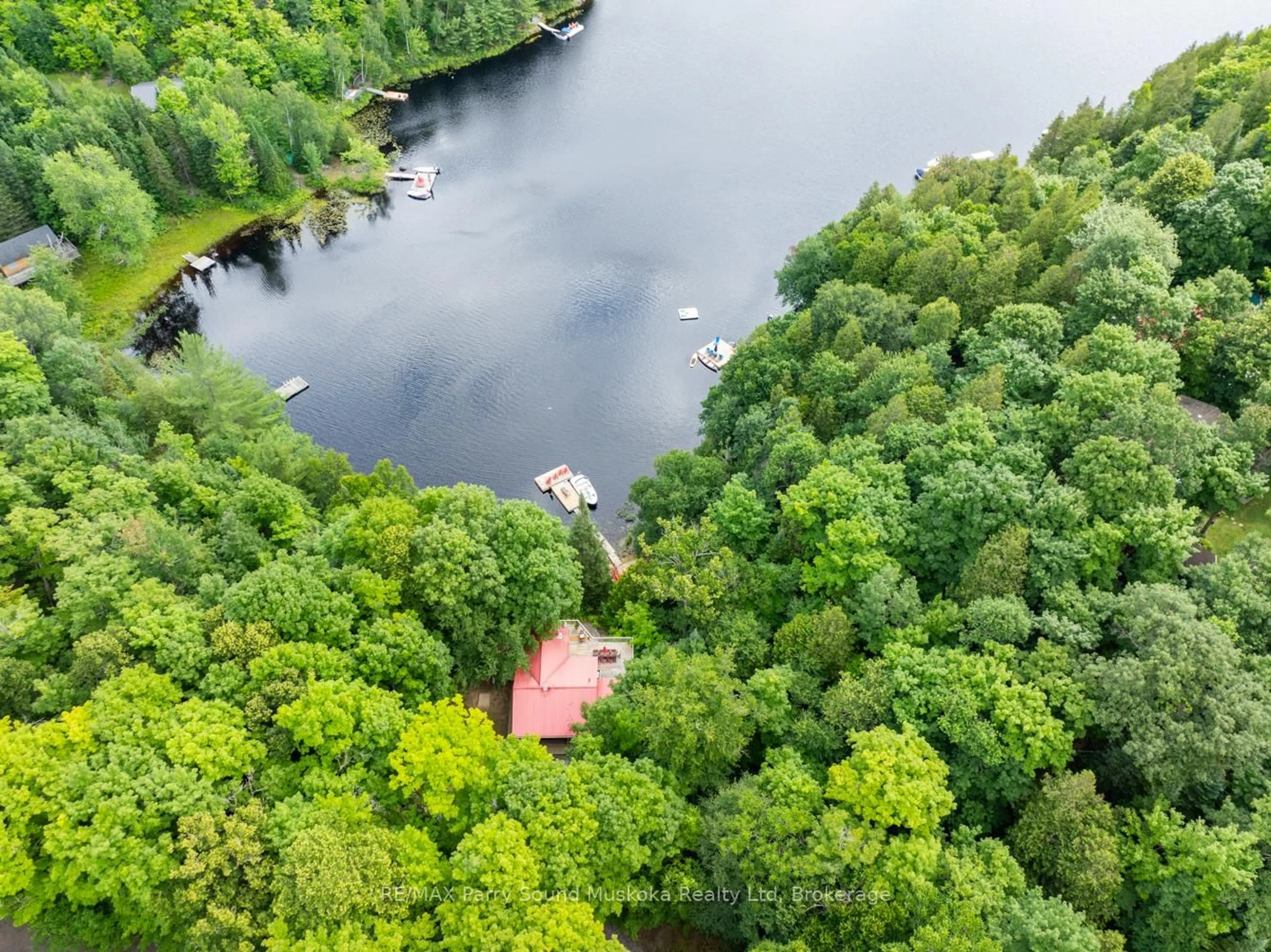 A pic from outside/outdoor area/front of a property/back of a property/a pic from drone, water/lake/river/ocean view for 74 CAPTAIN ESTATES RD N/A, Whitestone Ontario P0A 1G0