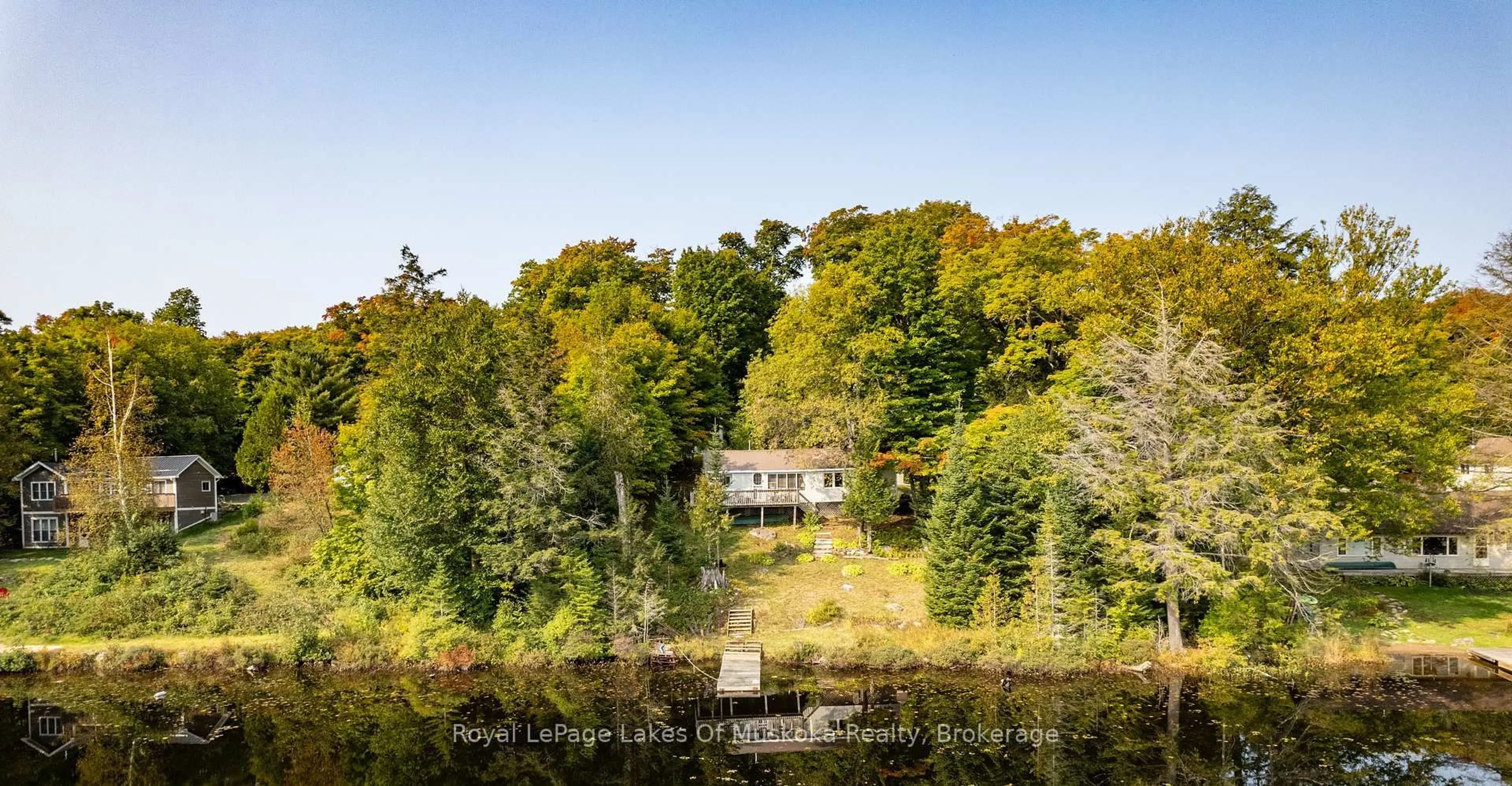 A pic from outside/outdoor area/front of a property/back of a property/a pic from drone, water/lake/river/ocean view for 1119 GRIST MILL Lane, Algonquin Highlands Ontario P0A 1E0